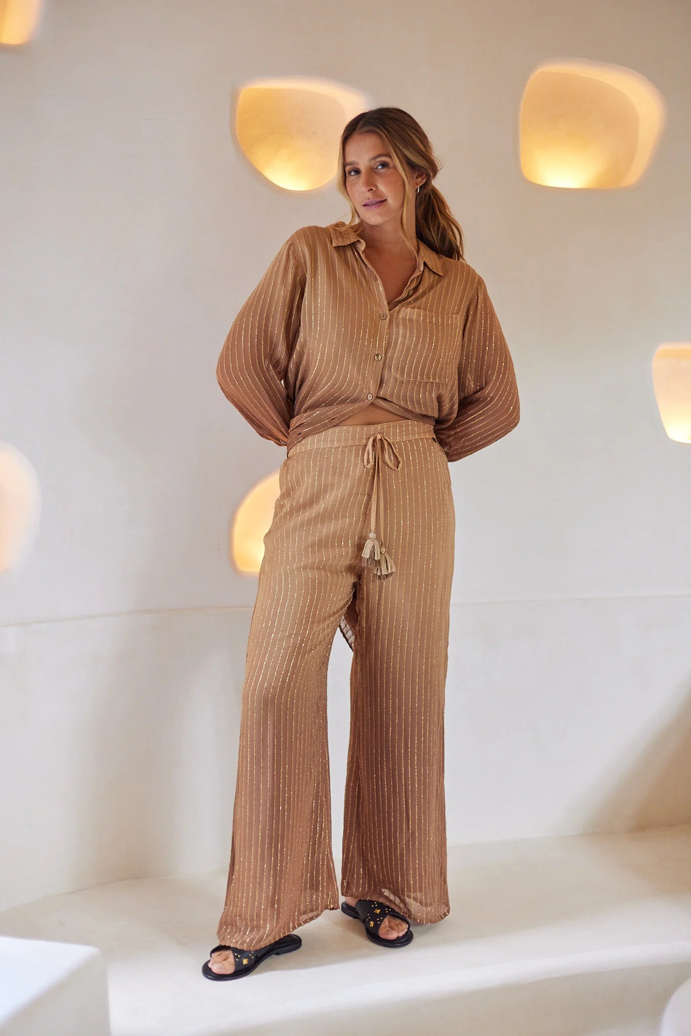 Long flowy pants with elastic waistband and tasseled drawstrings