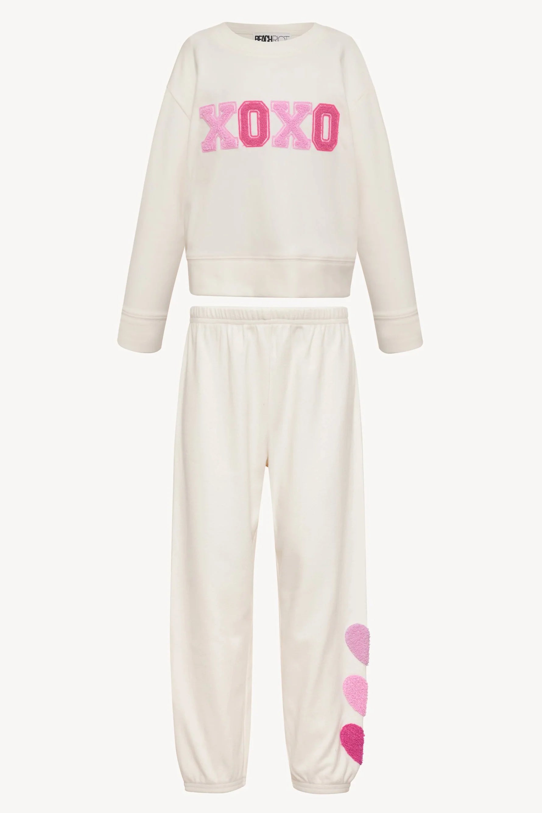 Girl's sweatpants with hearts down the left side in cream