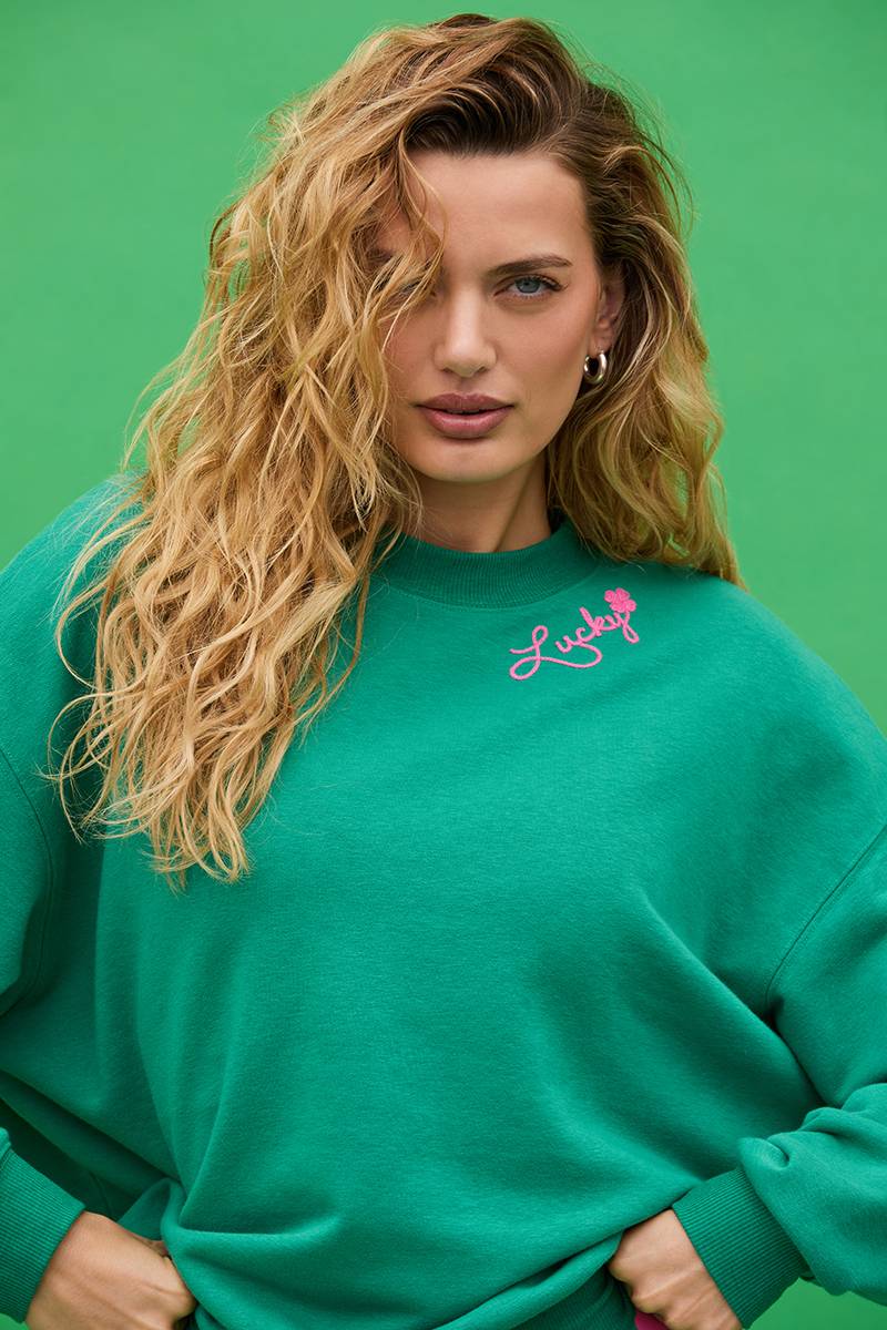 Green cotton sweatshirt with pink shamrock and lettering