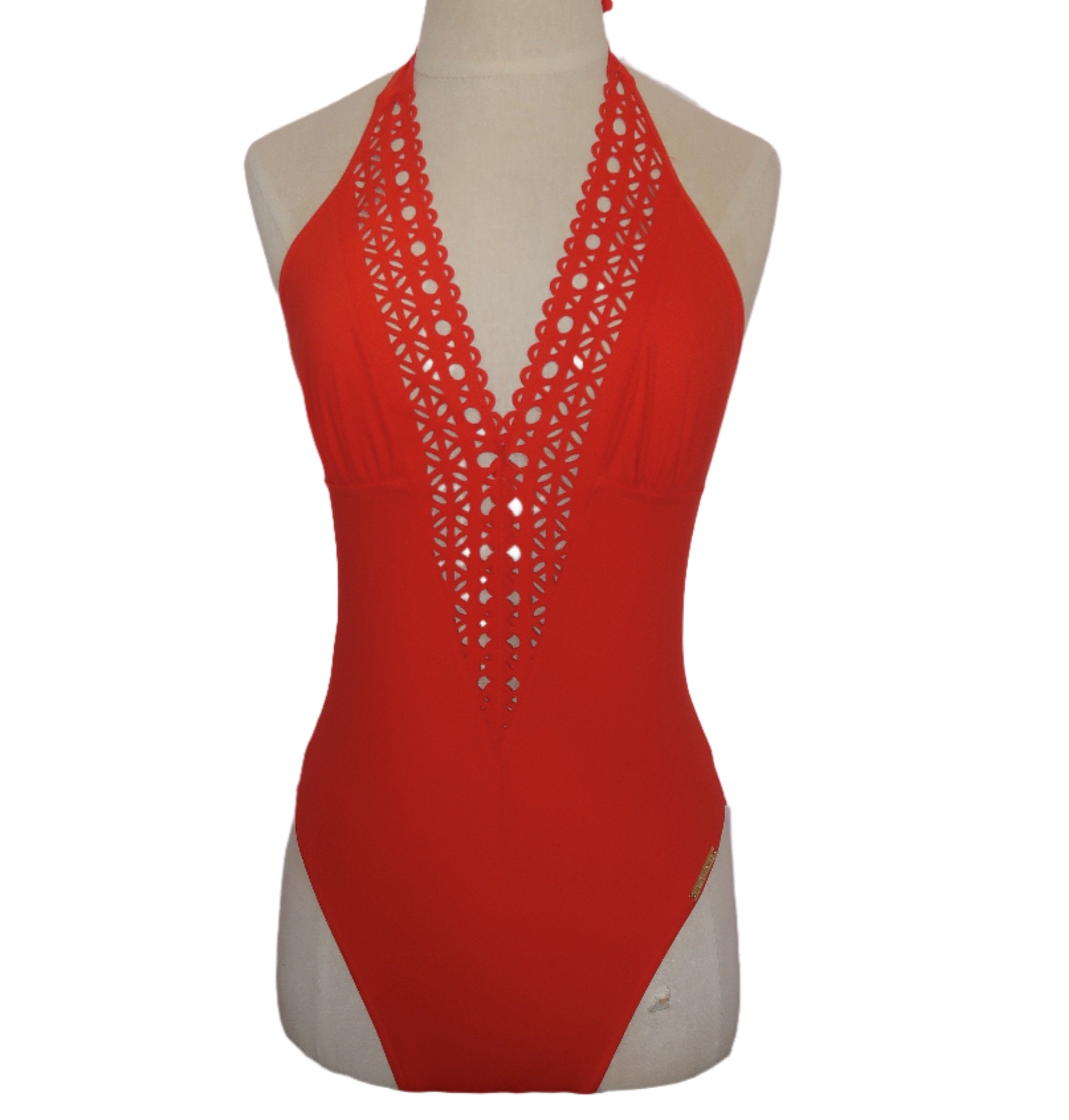 Plunging orange one piece.