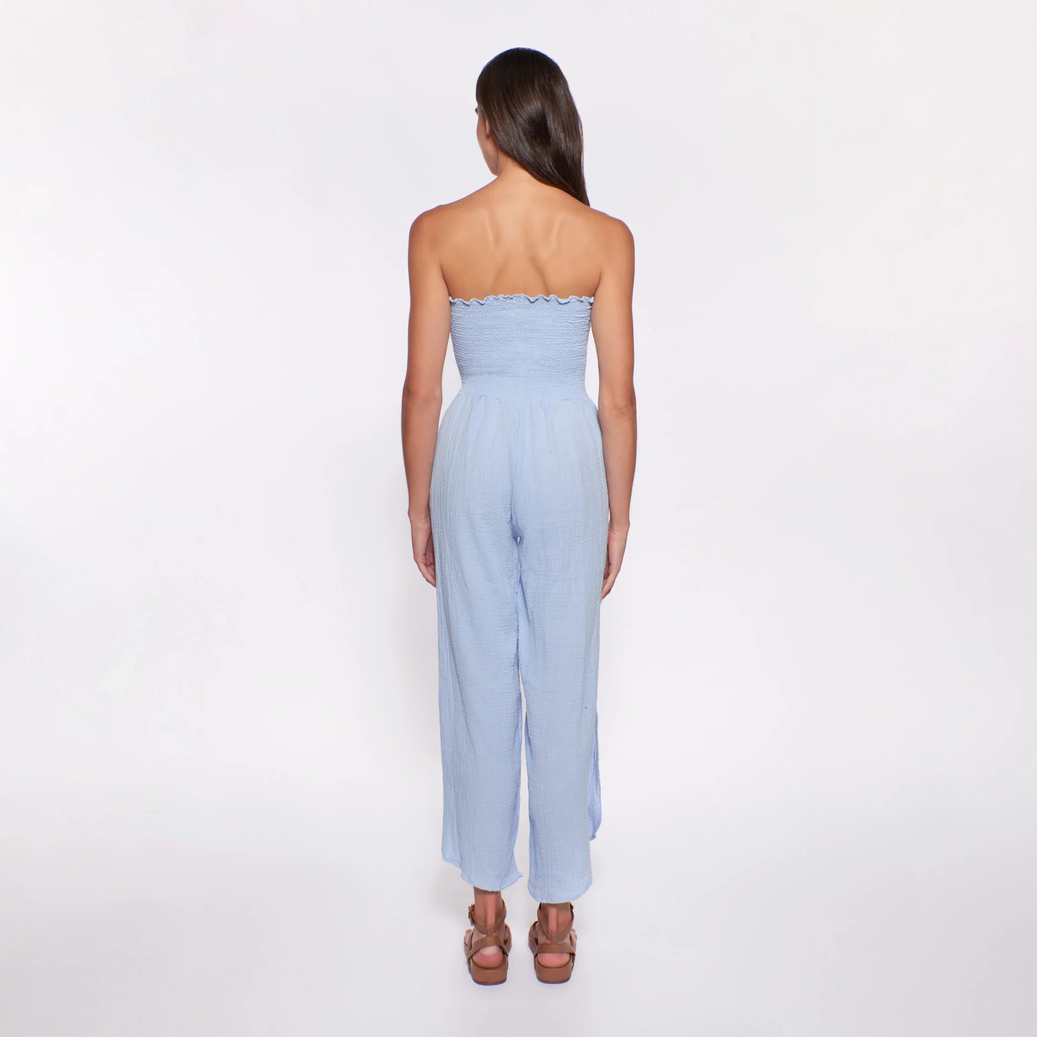 Strapless cotton jumpsuit with smocking on top in light blue
