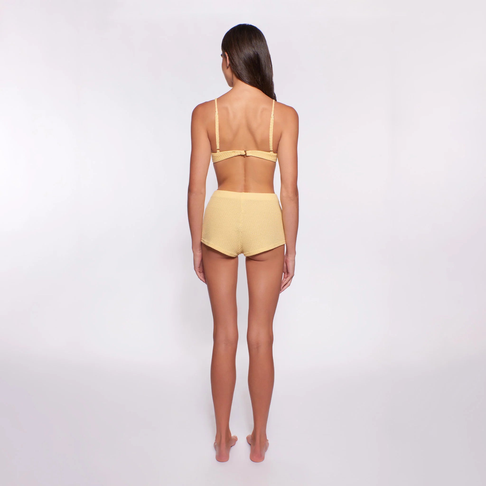 Textured short shorts with elastic waist in yellow