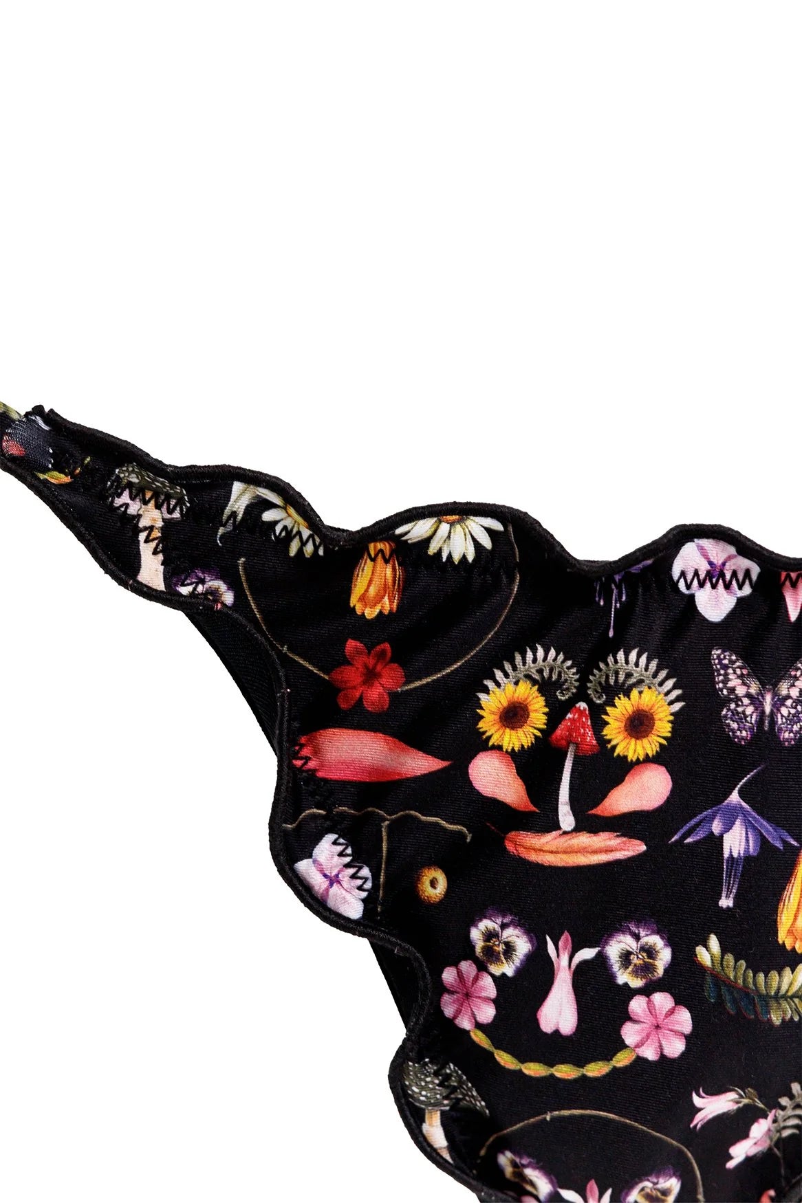 Tie side bottom with ruffled edges in black with floral print