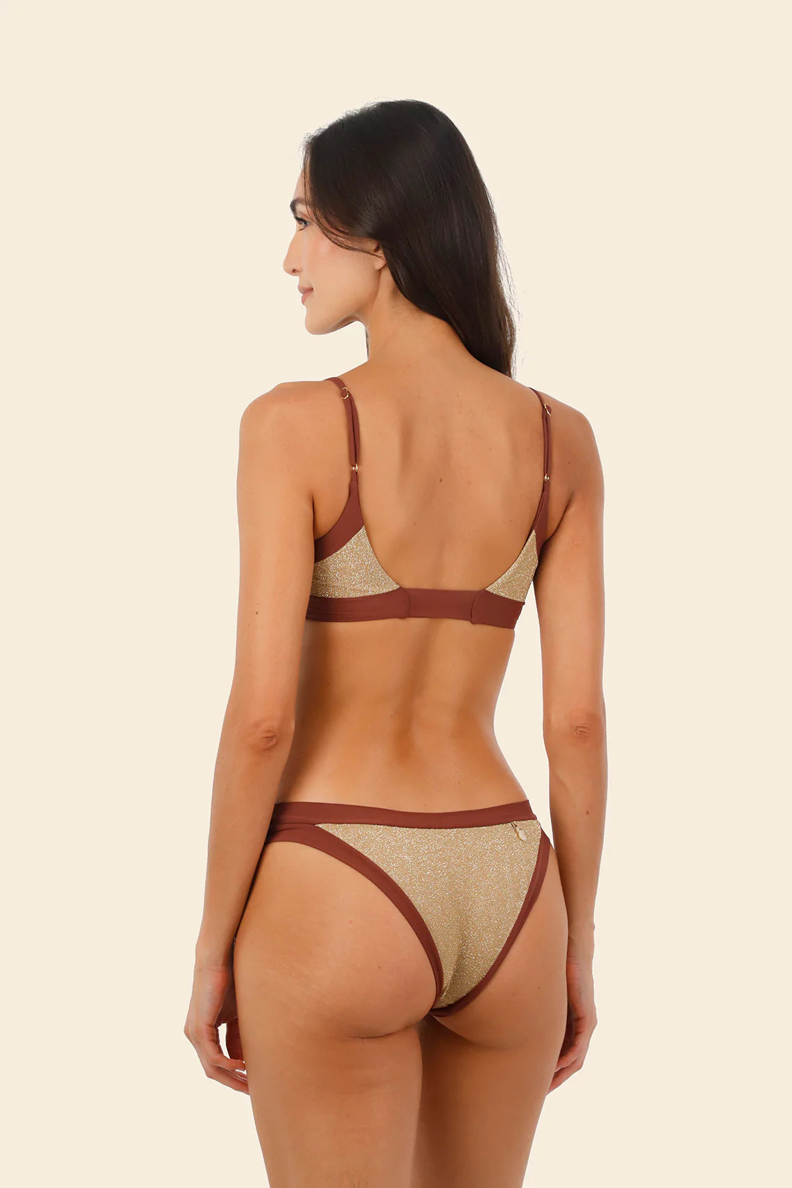 Shimmery color block bikini bottom in gold and dark red
