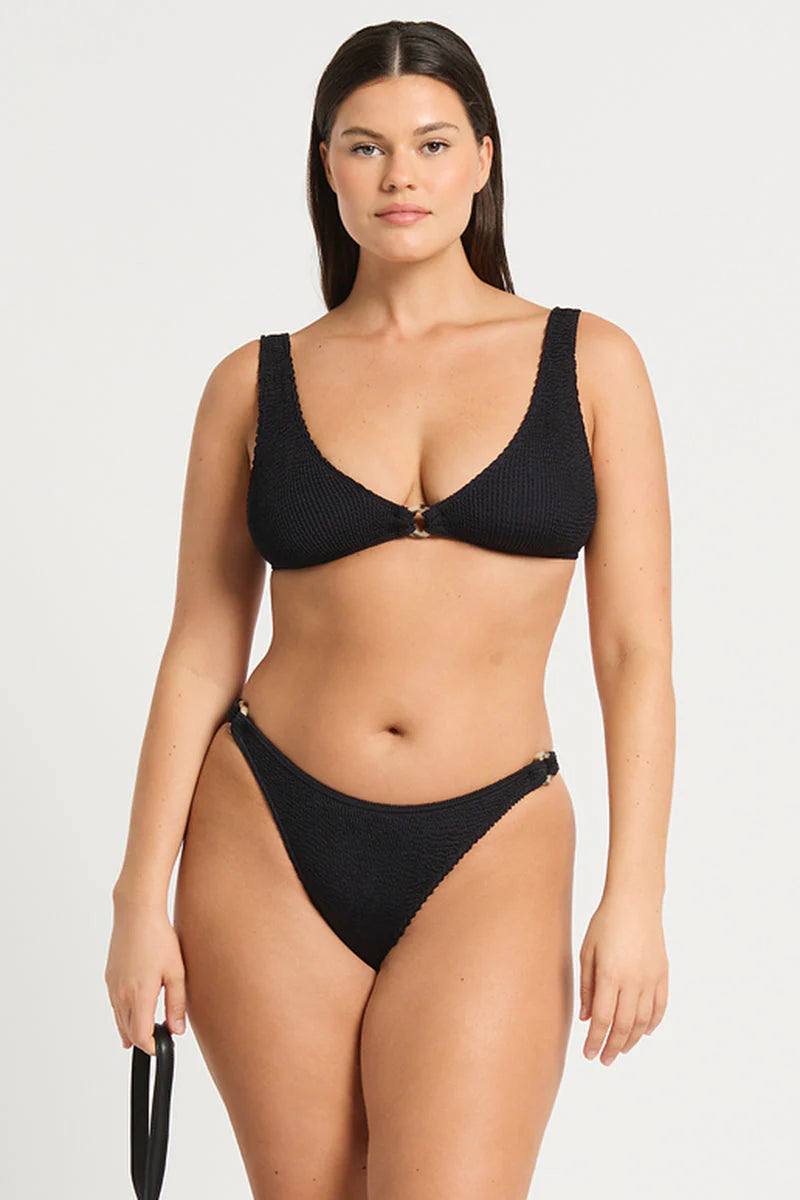 One size black bikini bottom with ring details on the sides