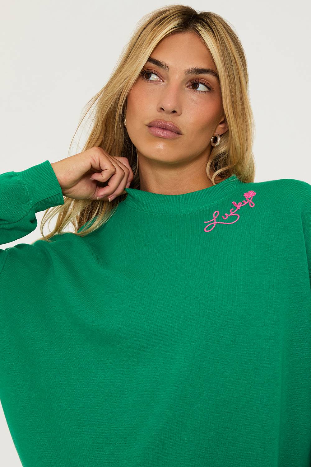 Green cotton sweatshirt with pink shamrock and lettering