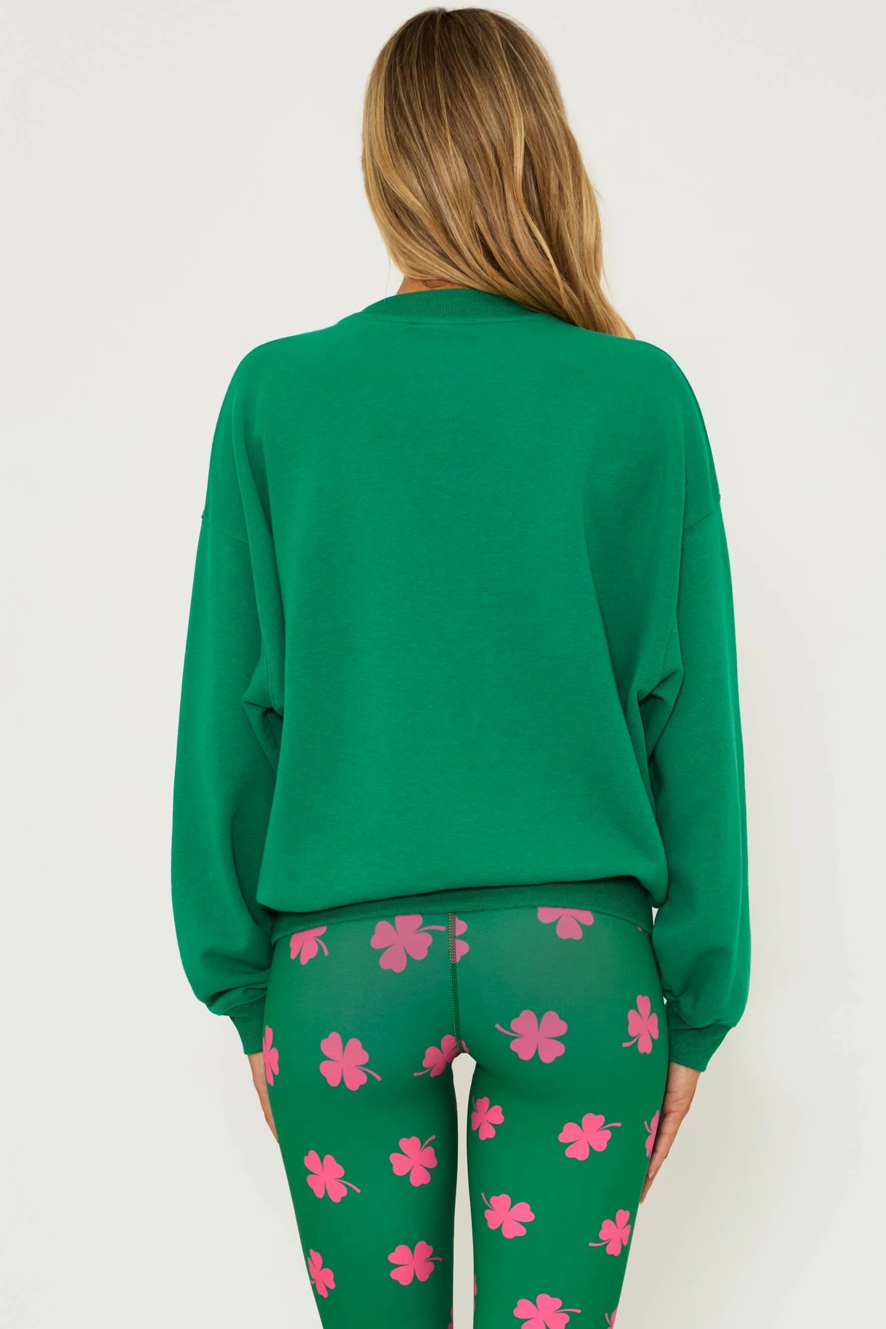Green cotton sweatshirt with pink shamrock and lettering