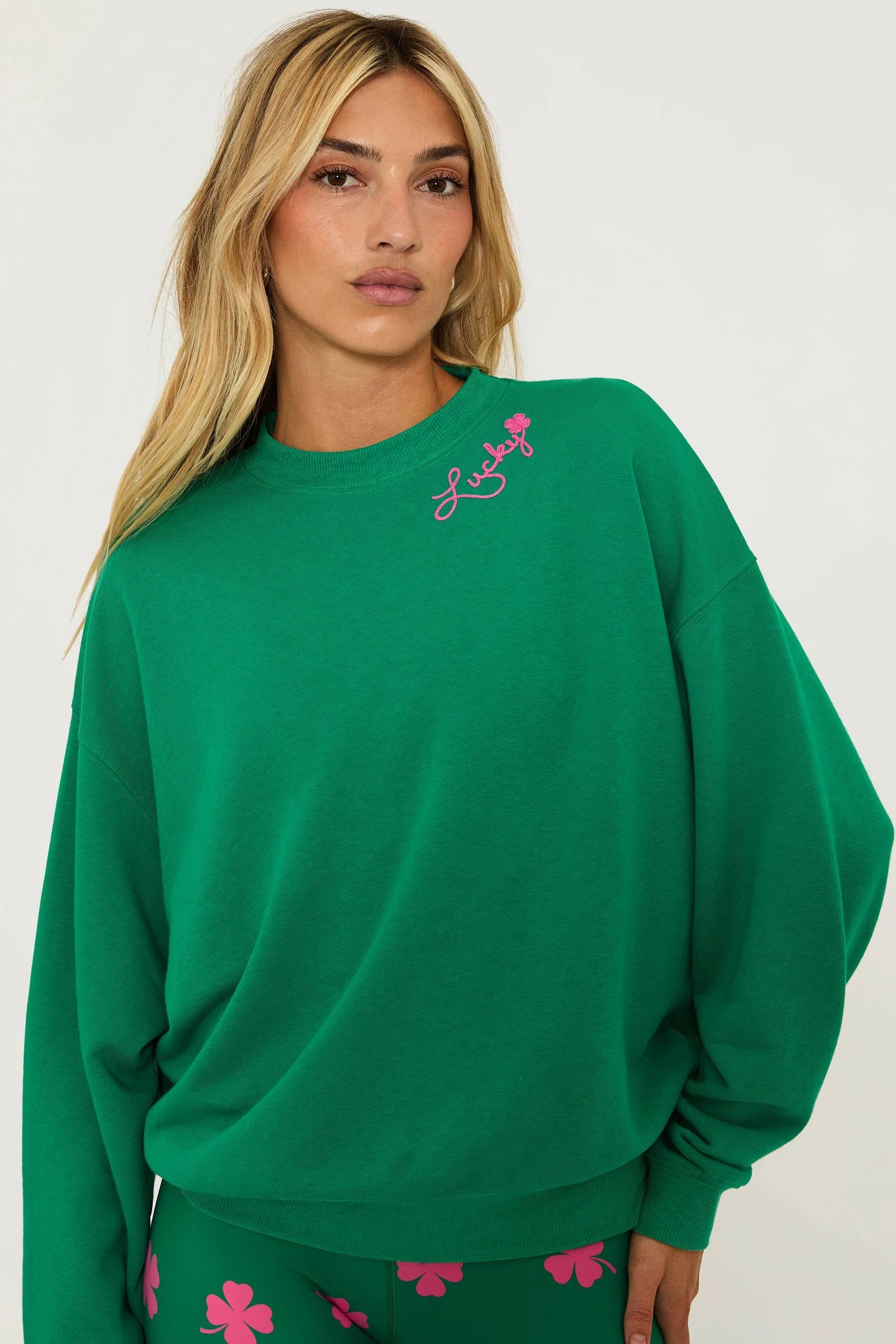 Green cotton sweatshirt with pink shamrock and lettering
