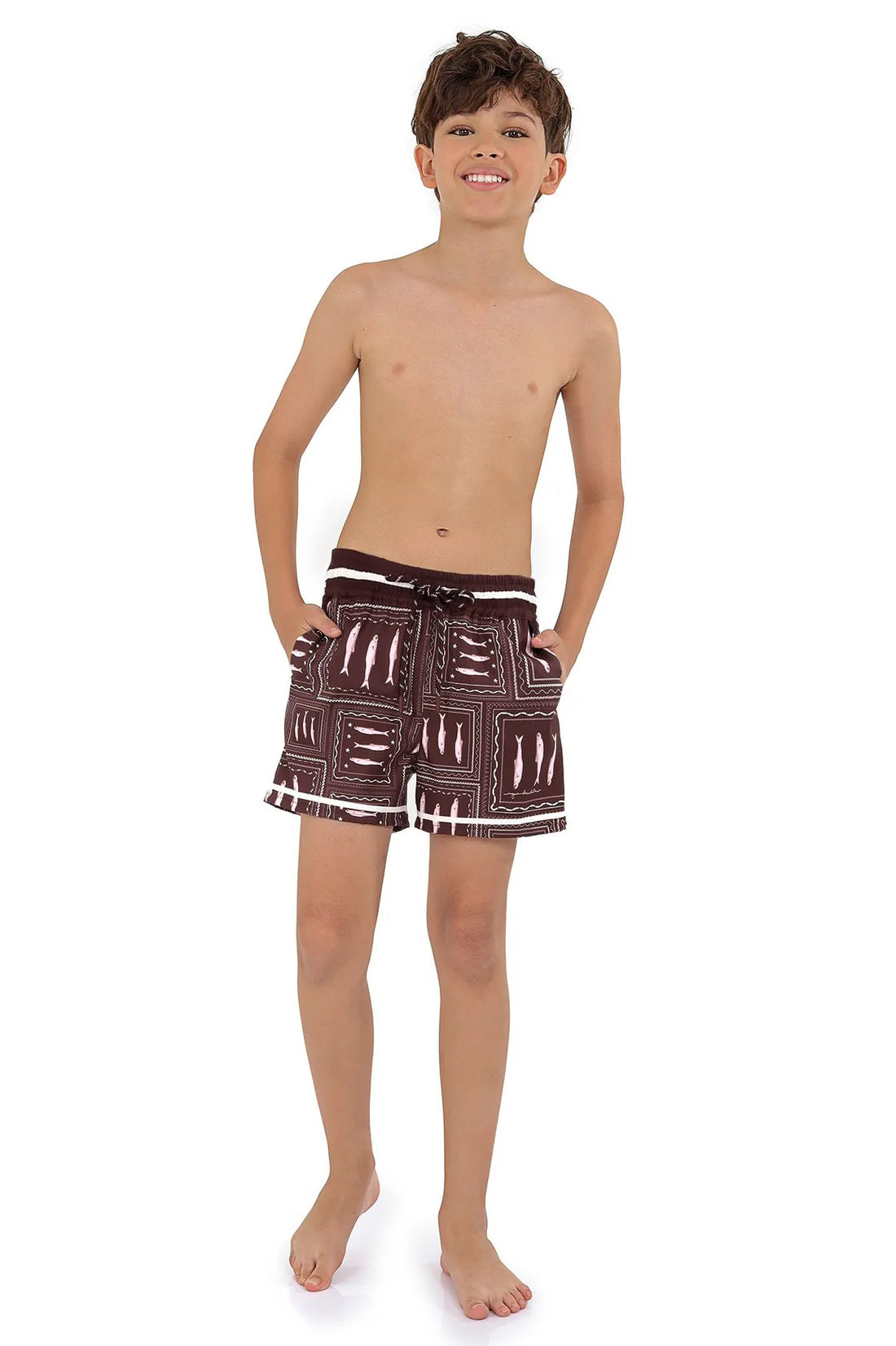Boys swim trunks in brown wih white print