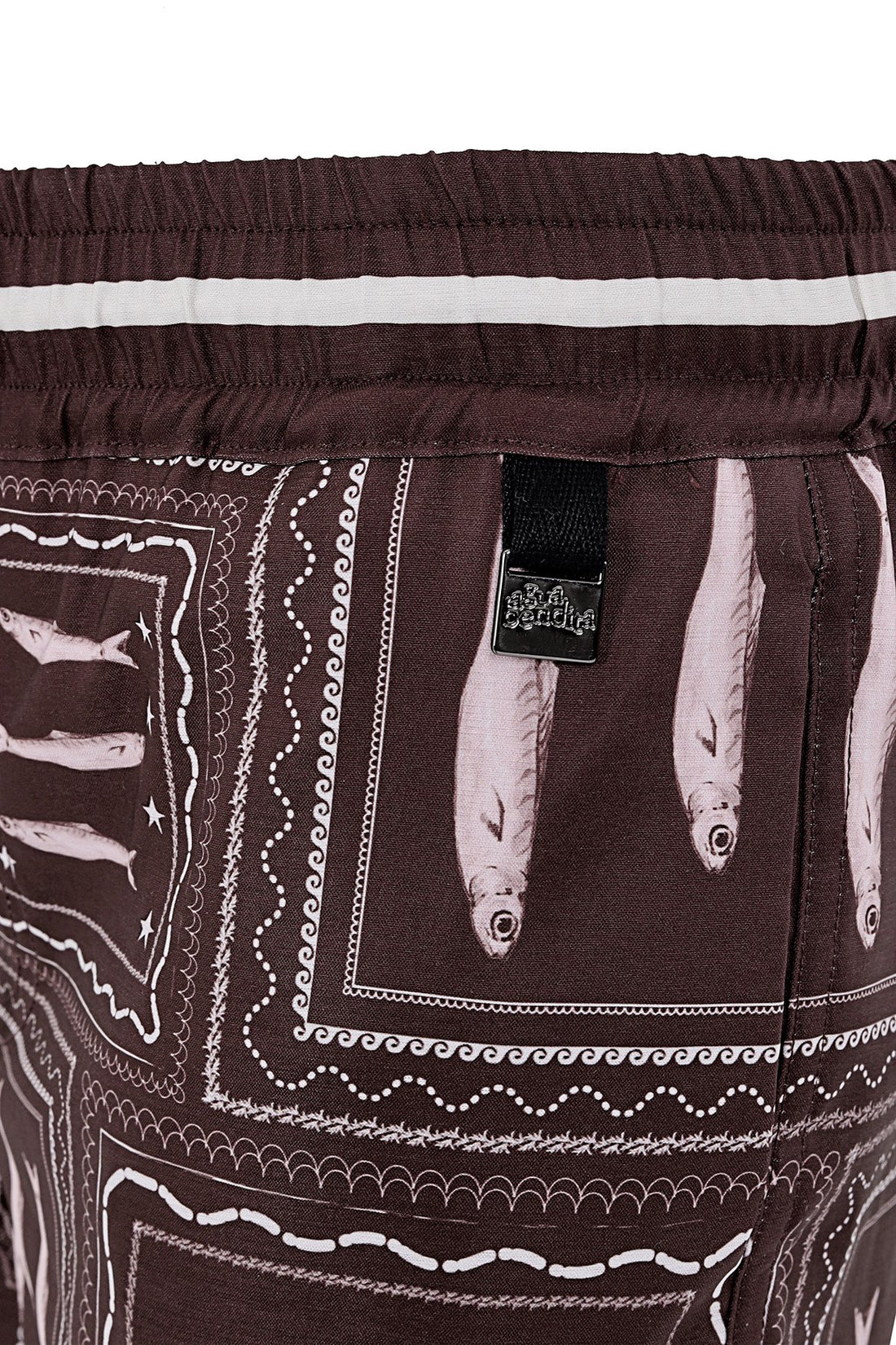 Boys swim trunks in brown wih white print