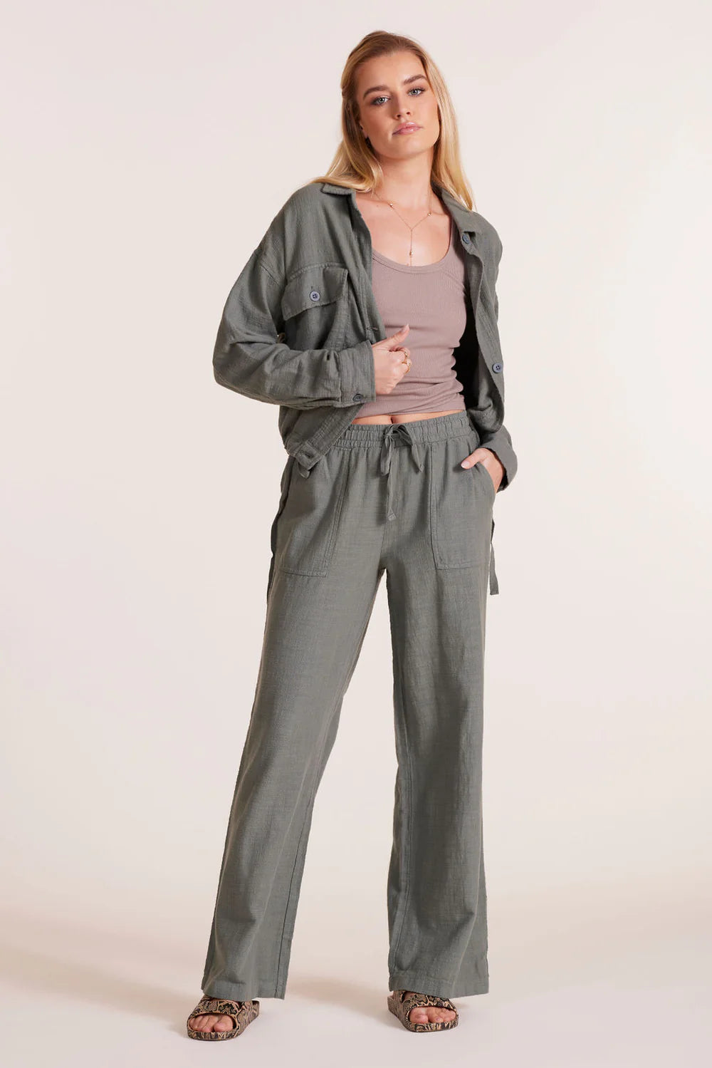 Wide leg cotton pants with tie waist and pockets in dark sage