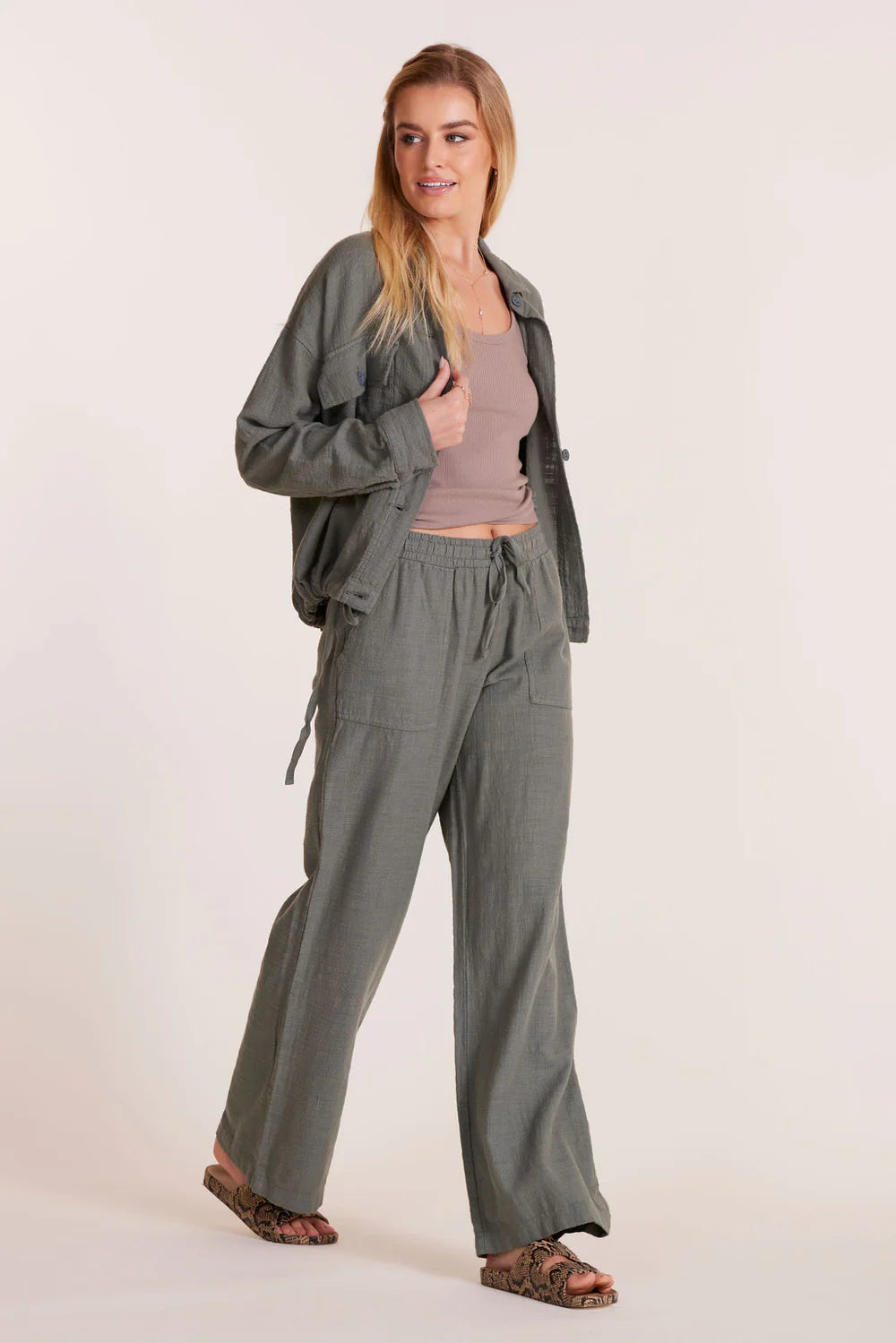 Wide leg cotton pants with tie waist and pockets in dark sage