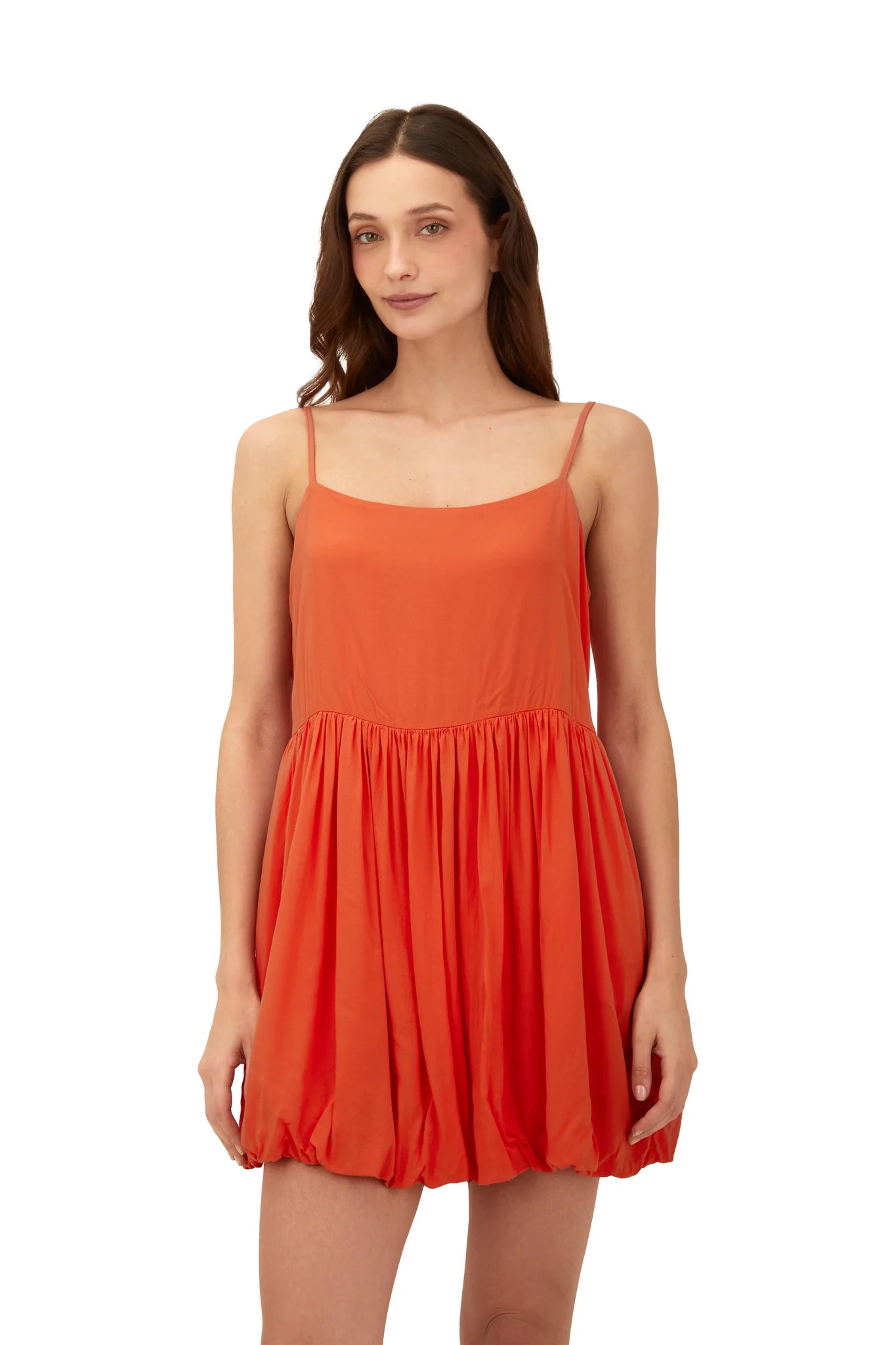 This dress showcases a U-wire neckline, ruched details at the top, and an open adjustable back. It’s the perfect piece for a beach-to-bar look.
