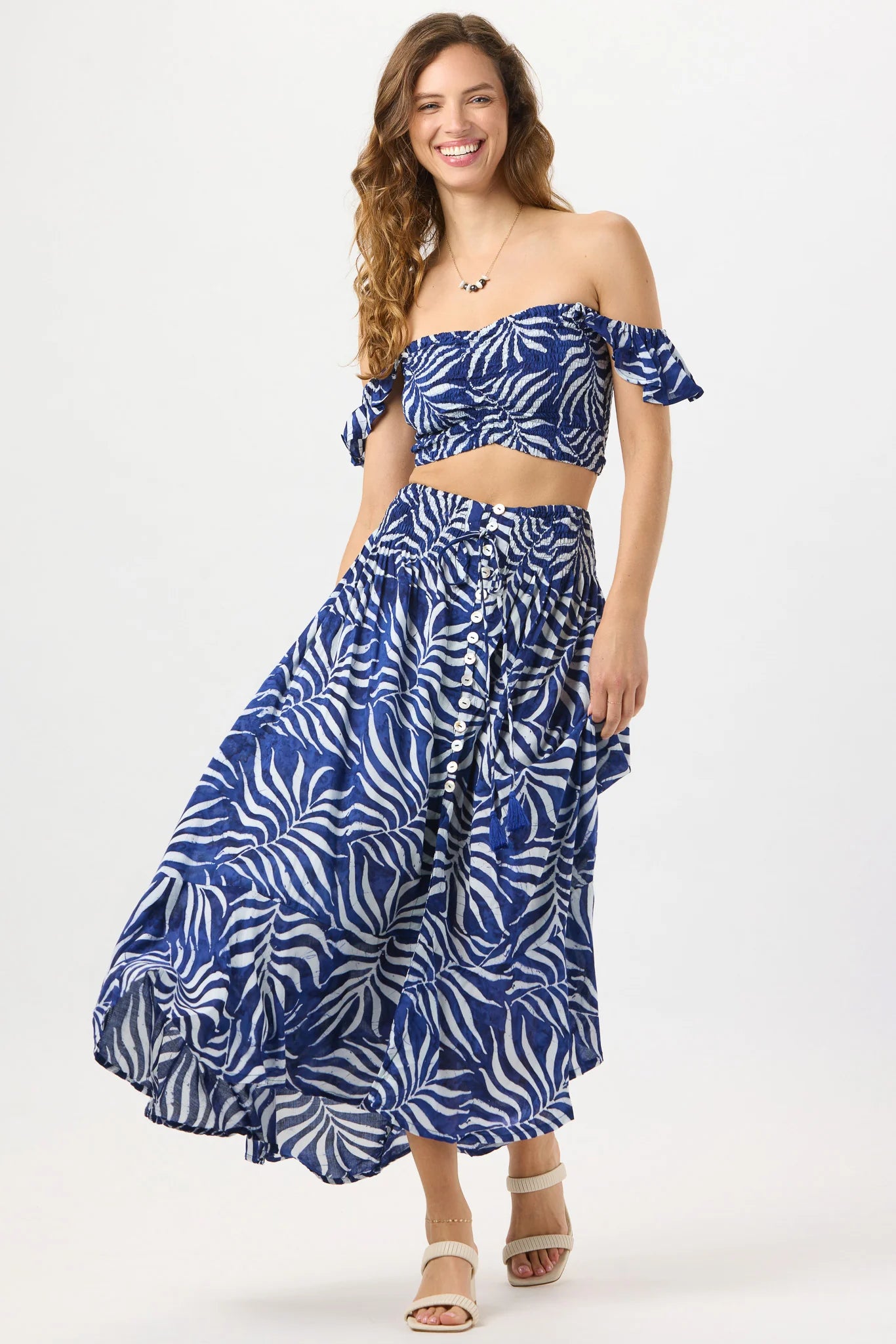 Smocked crop top with ruffle straps in navy print