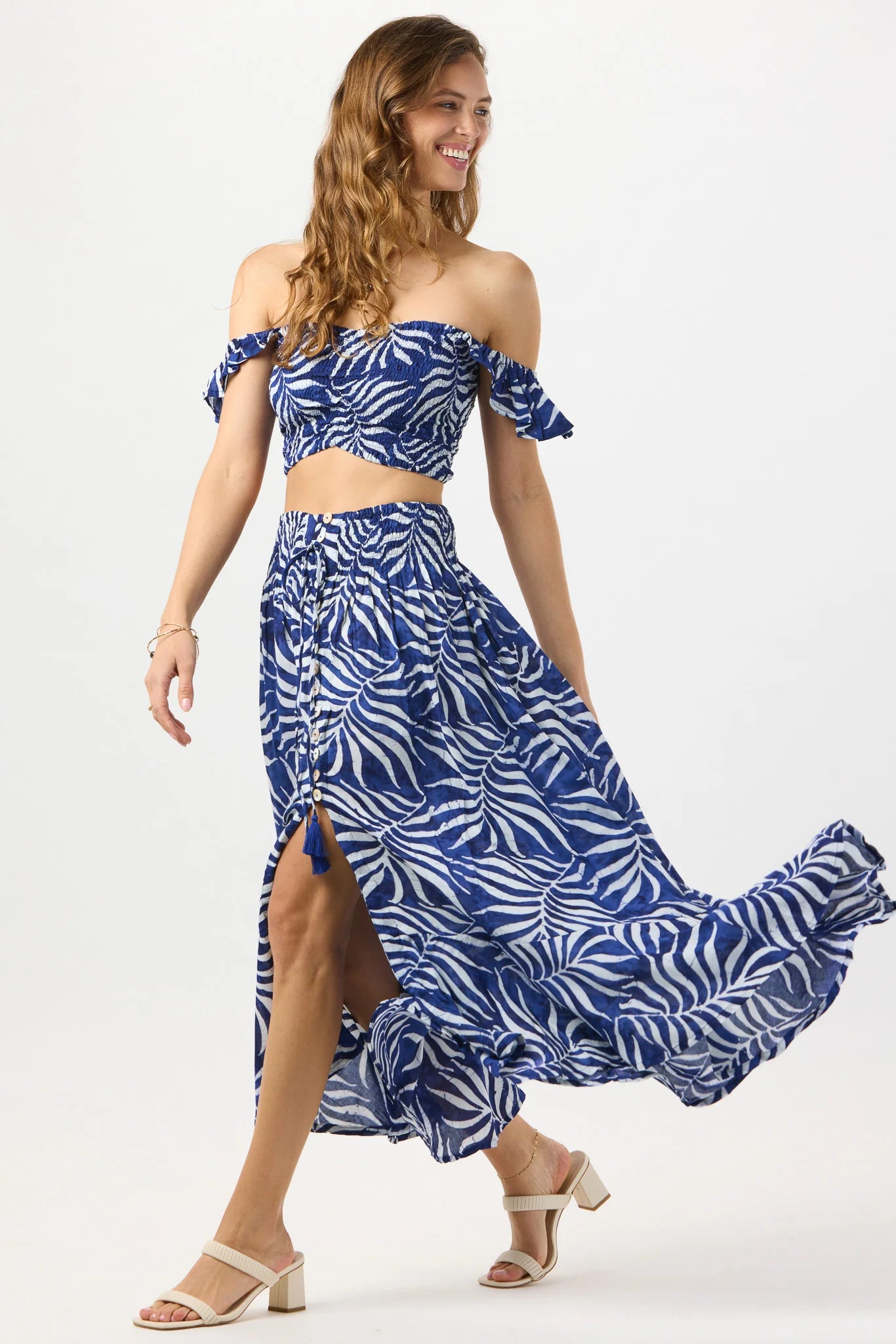 Smocked crop top with ruffle straps in navy print