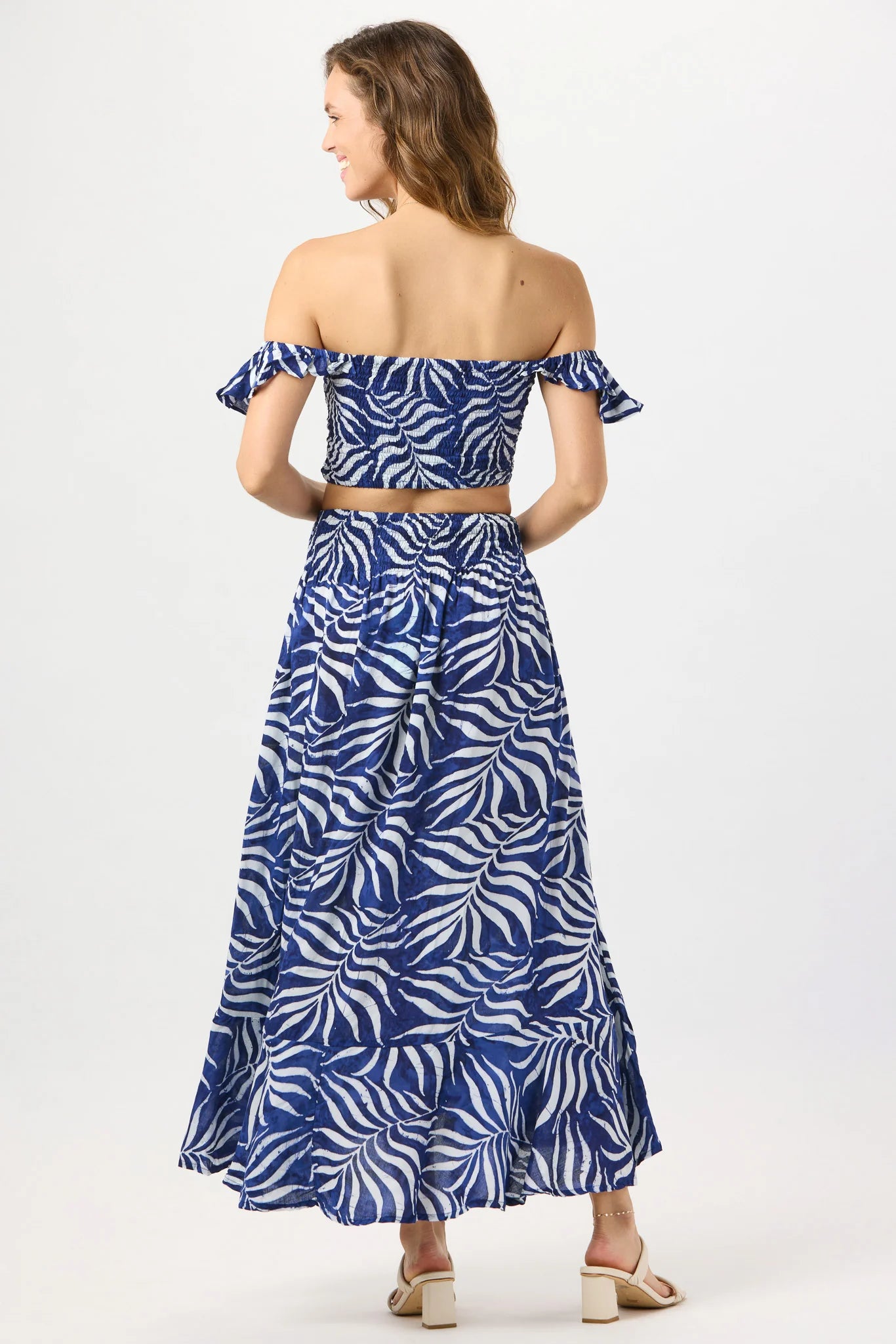 Smocked crop top with ruffle straps in navy print