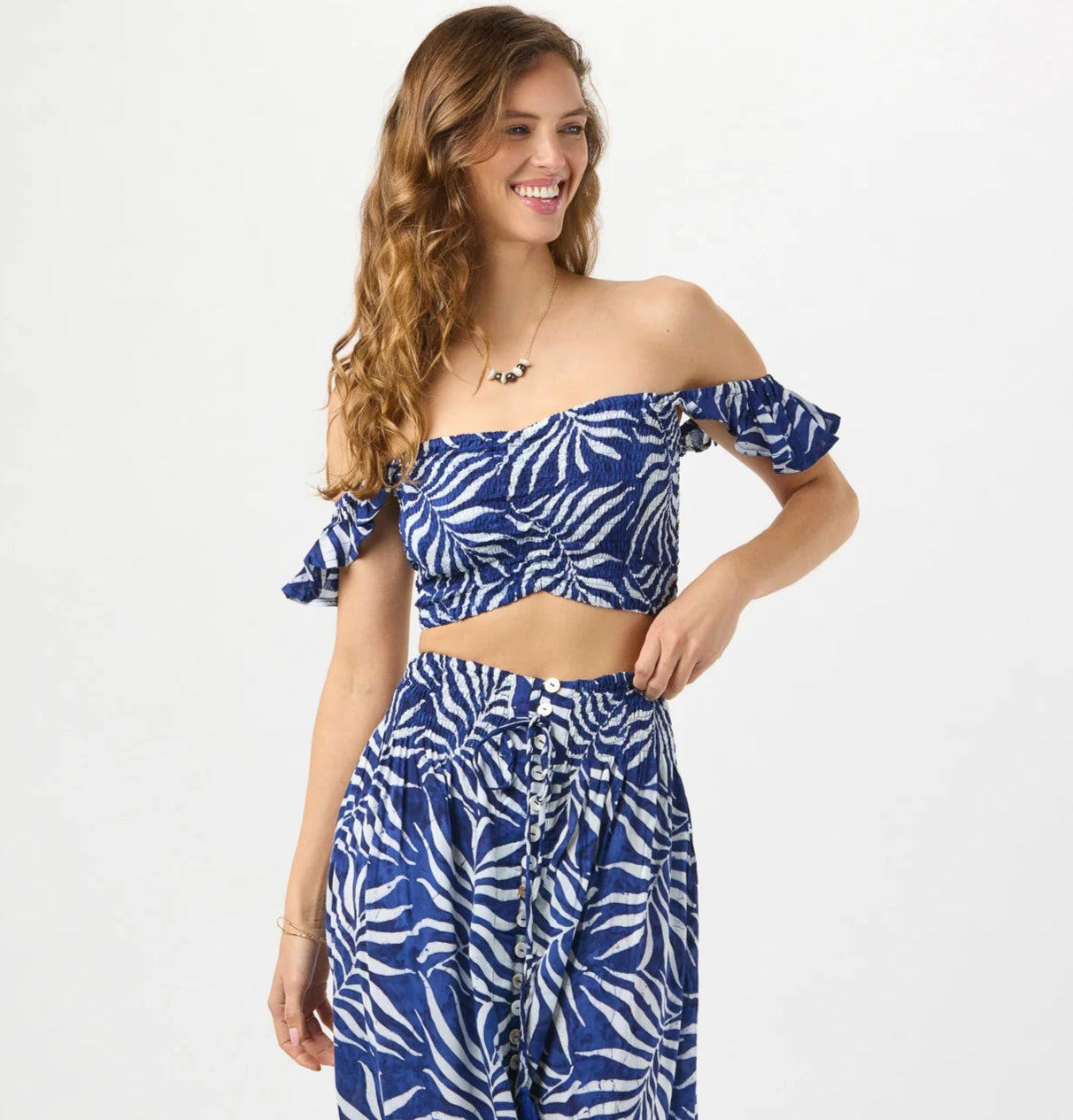 Smocked crop top with ruffle straps in navy print