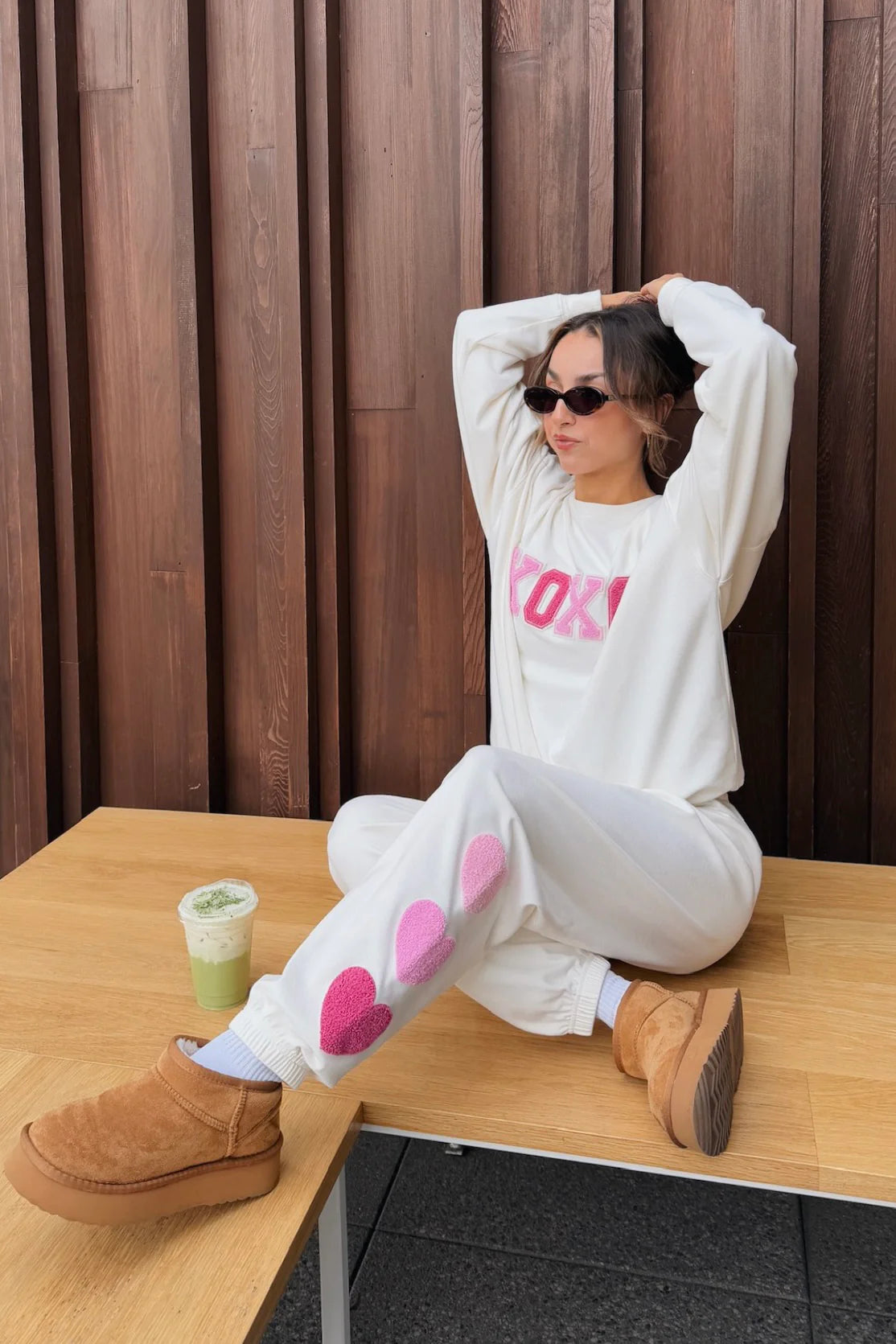 Sweatpants with hearts down the left side in cream