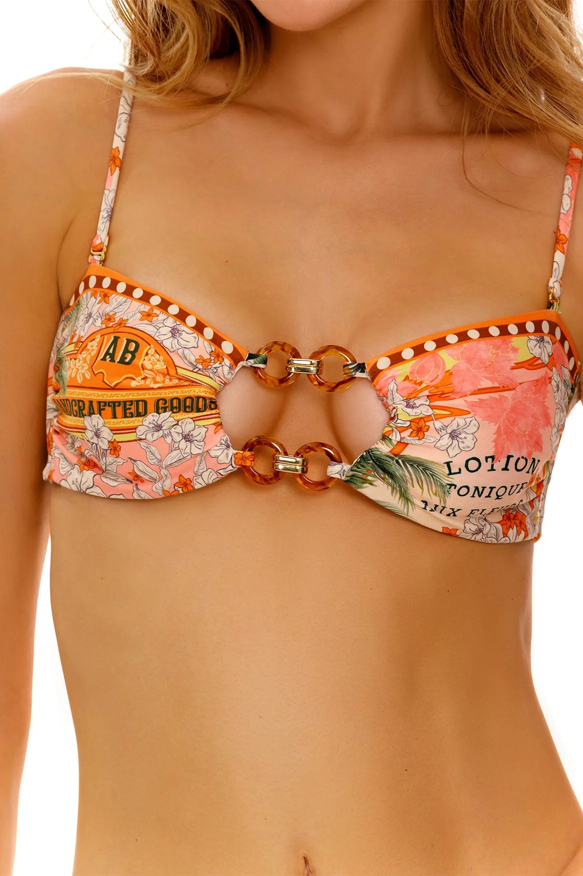 Multicolor bandeau top with removable straps, front cutout, and ring details