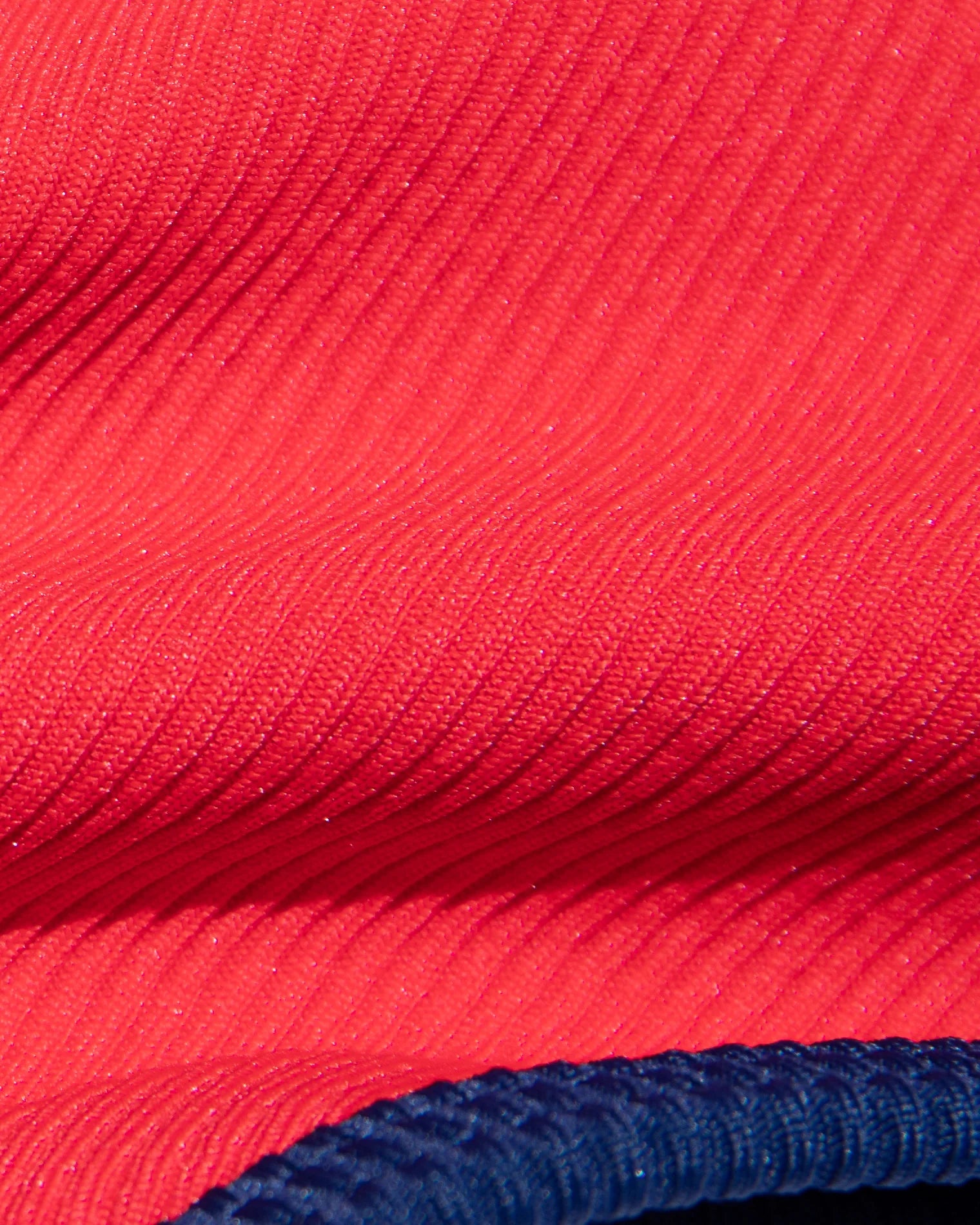 Ribbed red bottom with dark blue bordering and a amid rise fit