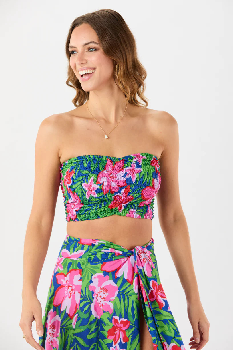 Sleeveless smocked crop top in vibrant Hawaiian print