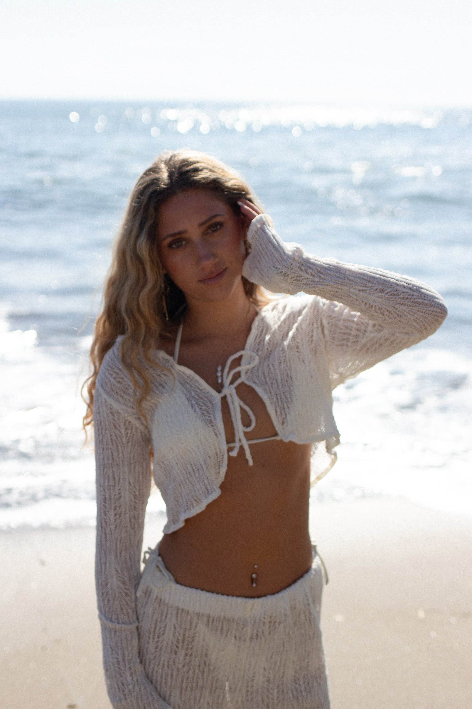 Sheer long sleeve crop top with tie front in ivory