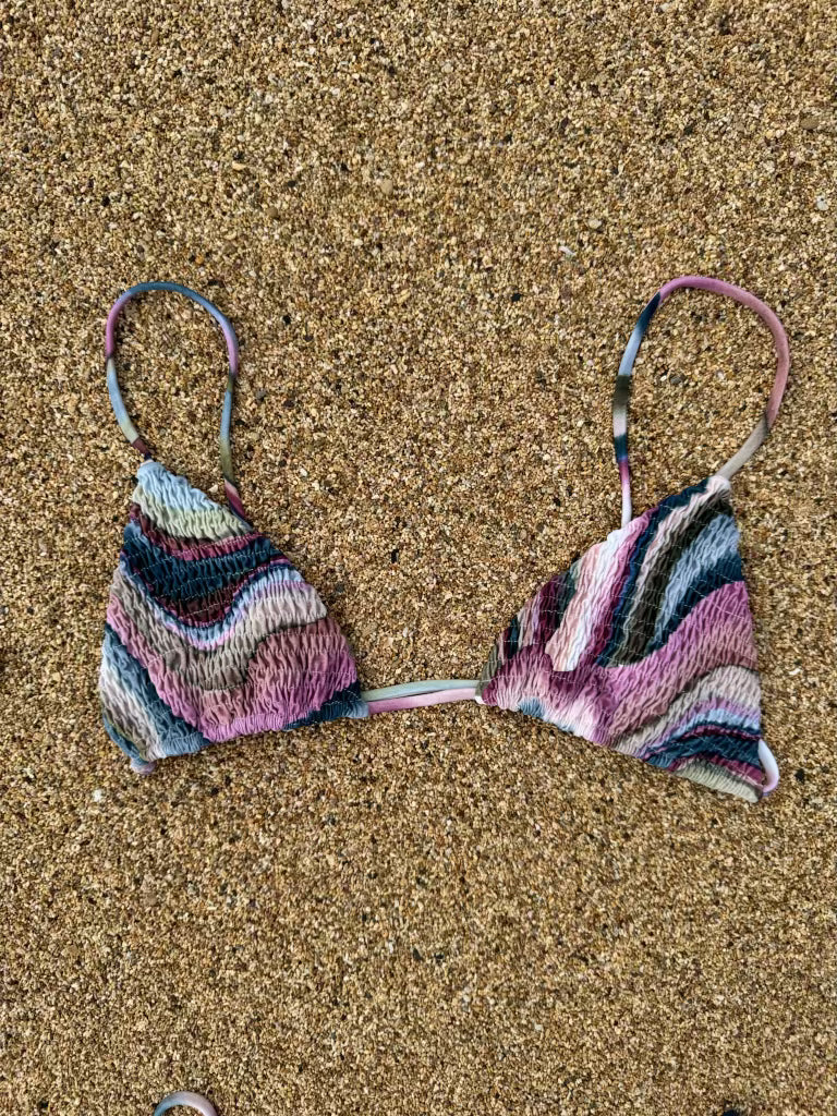 Reversible triangle top with texture on one side and adjustable straps in multicolor print