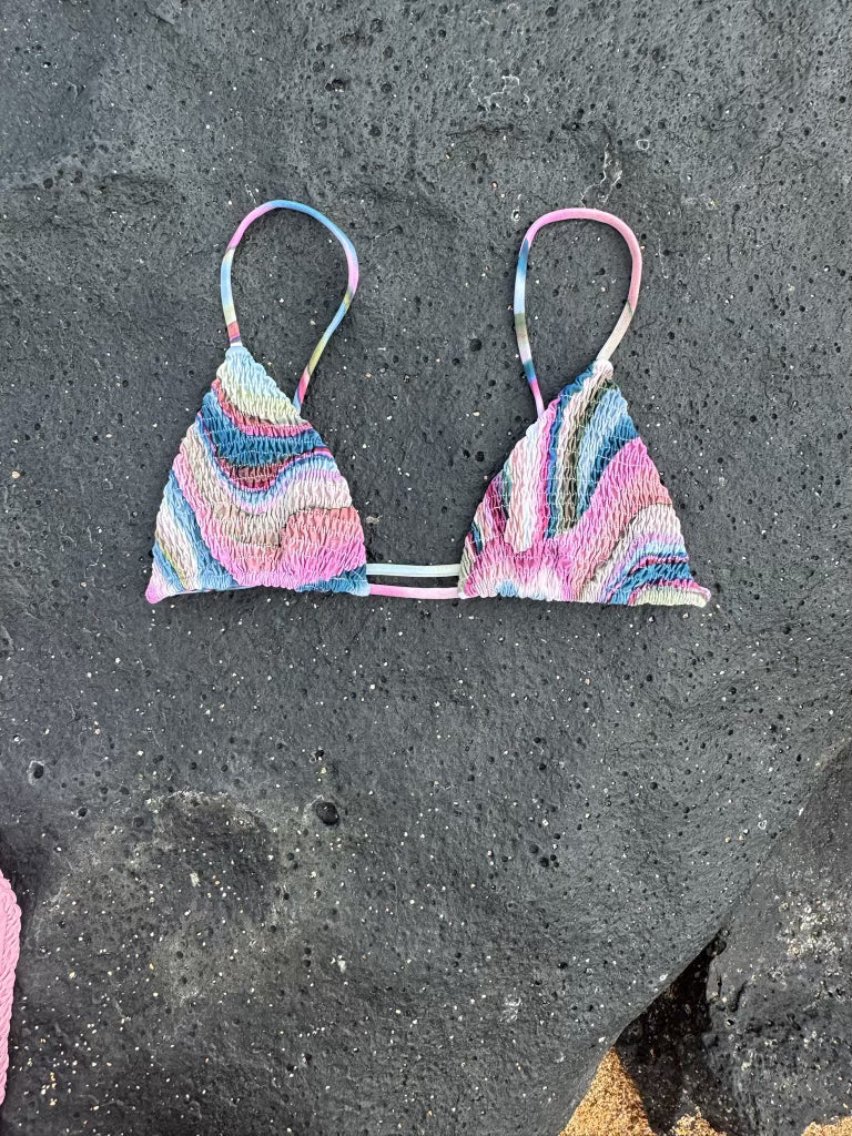 Reversible triangle top with texture on one side and adjustable straps in multicolor print