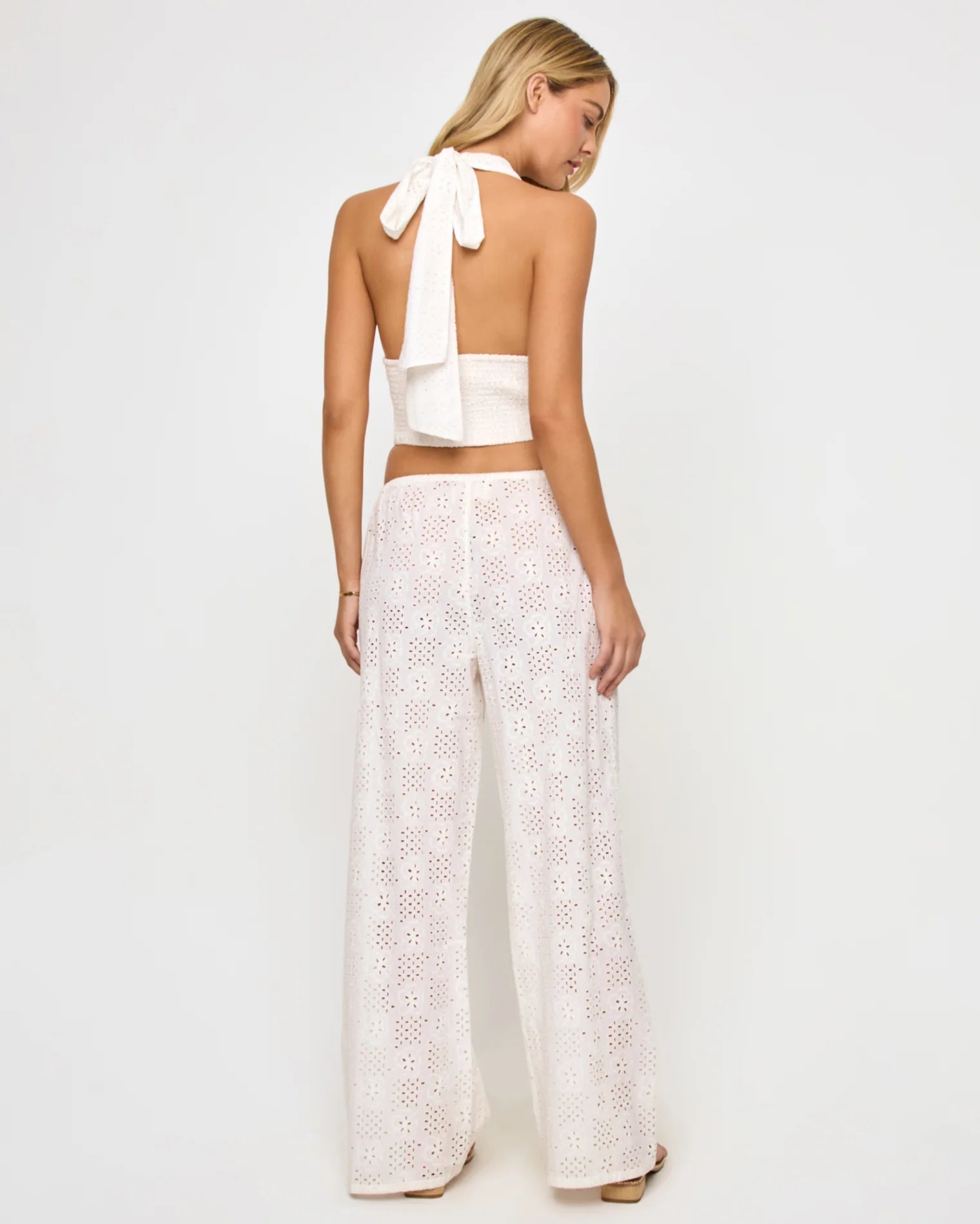 Cropped halter top with a deep plunging neckline in Cream