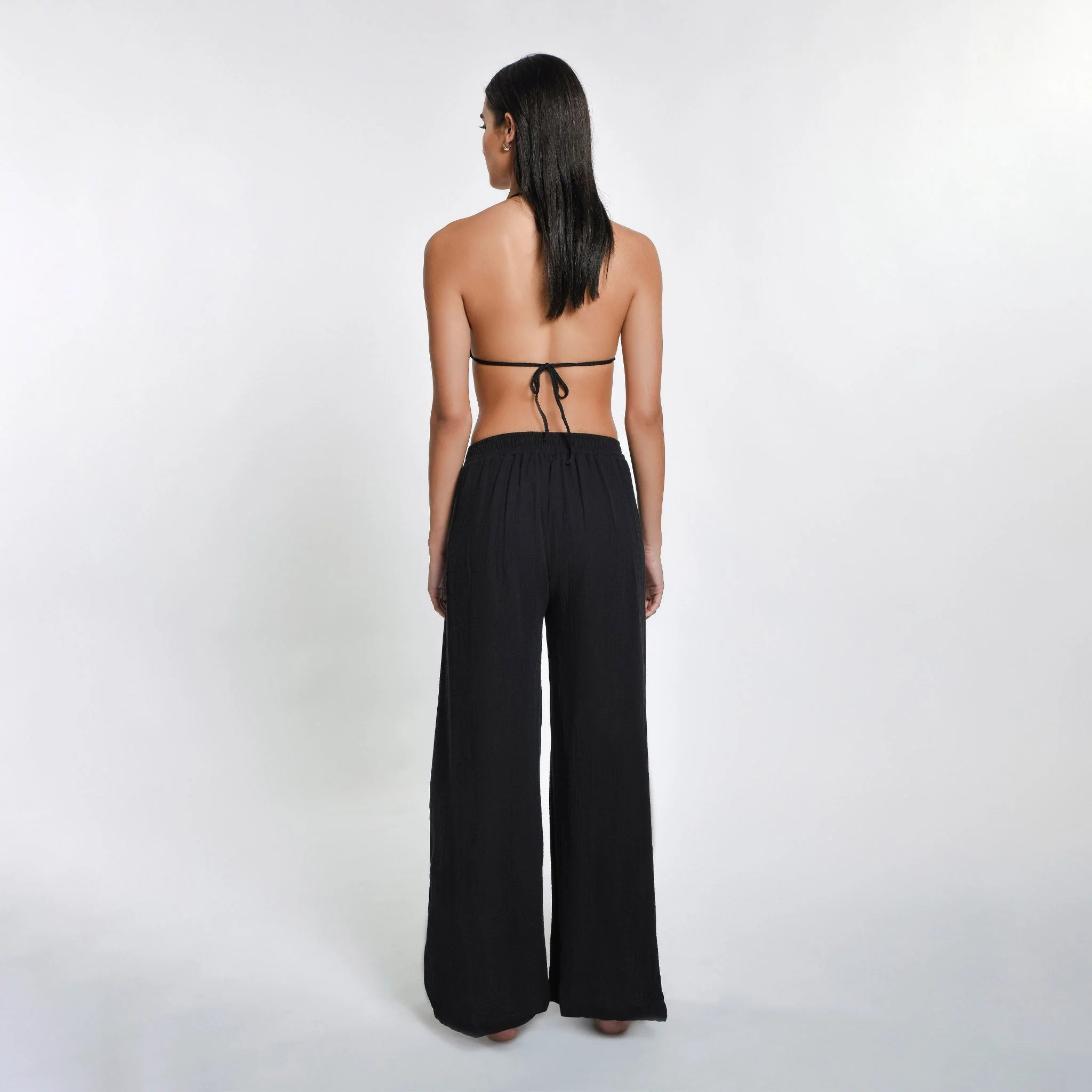 Black cotton wrap pants with side slit and tie front
