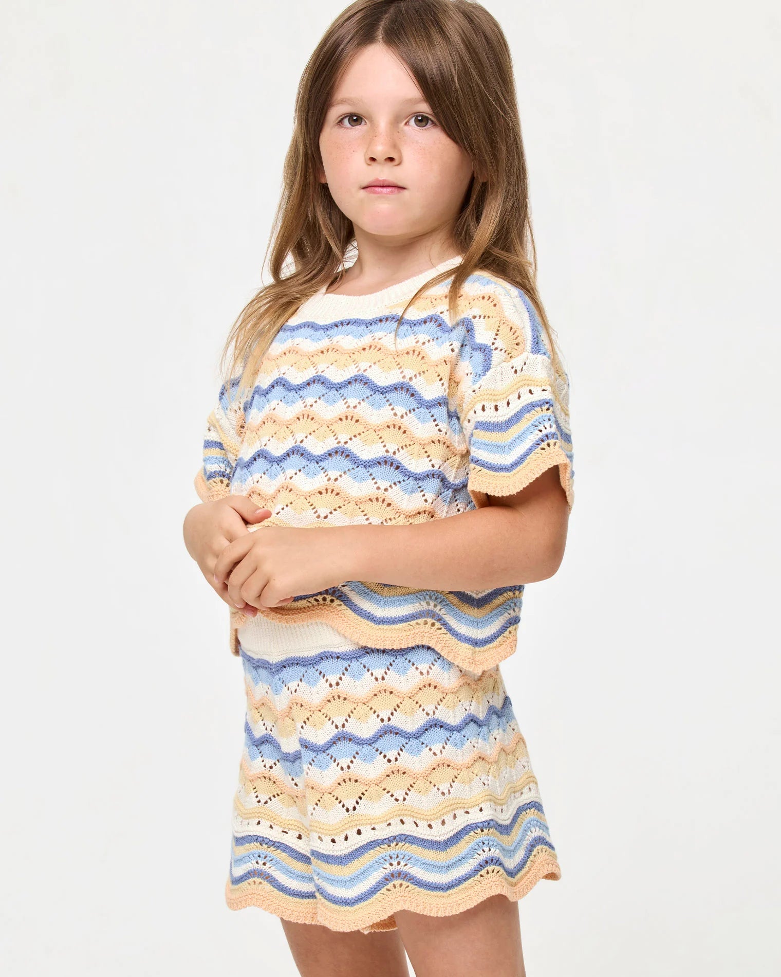 Girls' top and shorts set with scalloped hem in wavy multicolor stripes