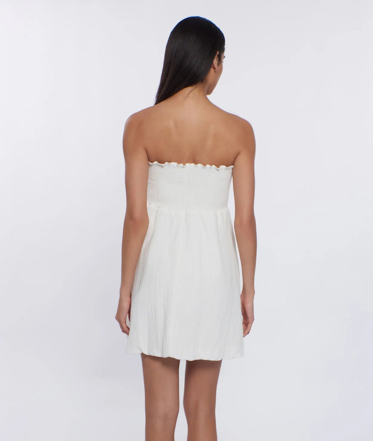 Strapless mini dress with smocking on top in white