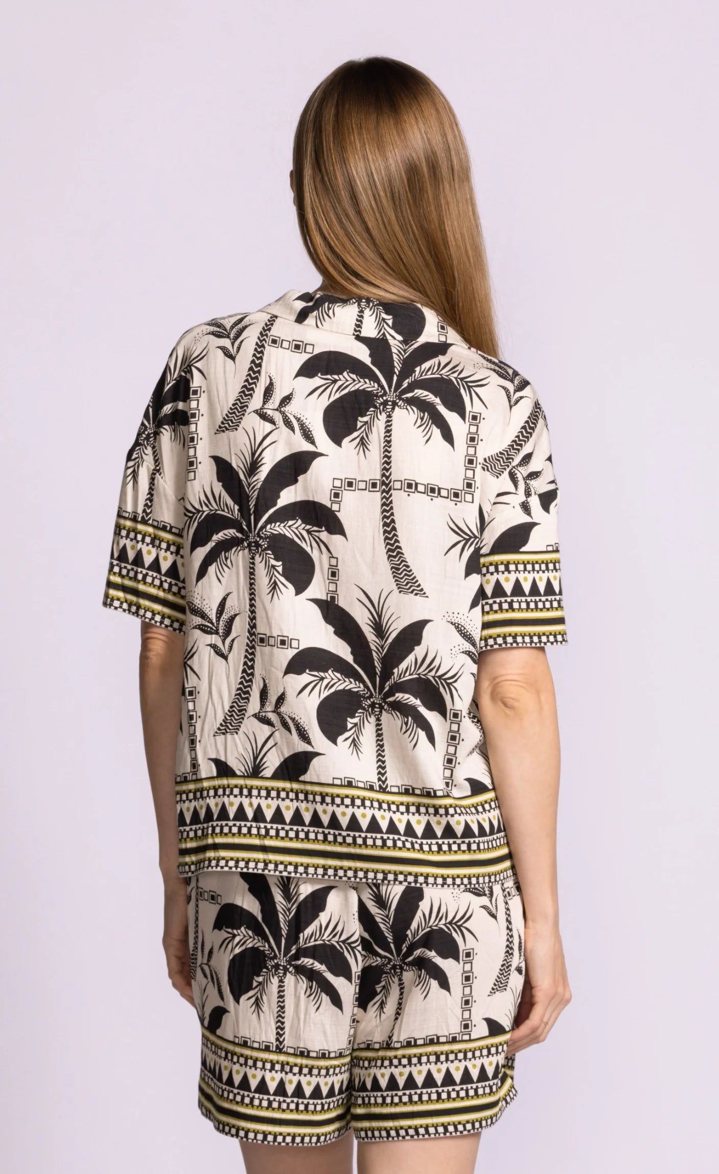 Collared button down shirt in palm tree print