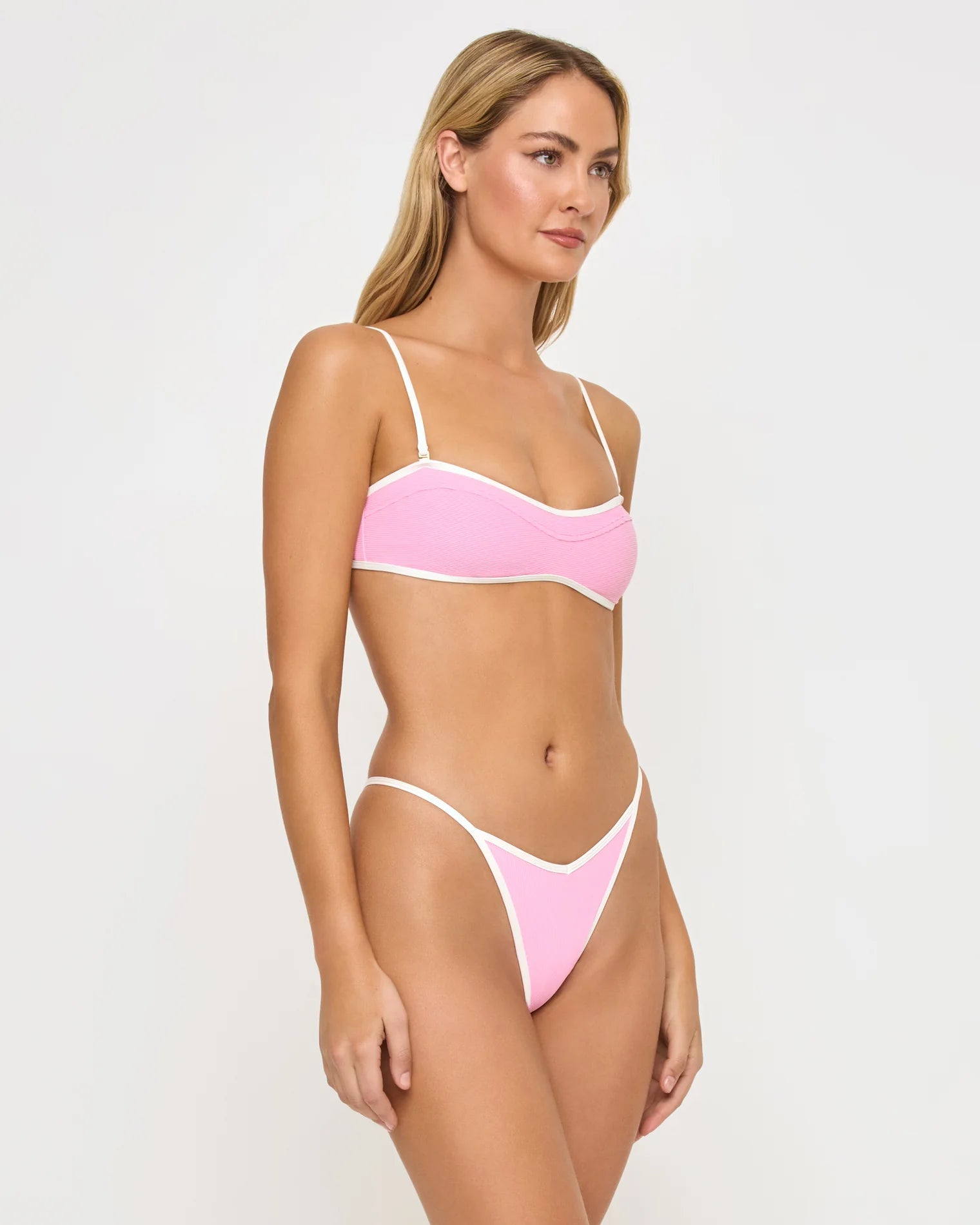 Ribbed pink bandeau top with cream color blocking and removable straps