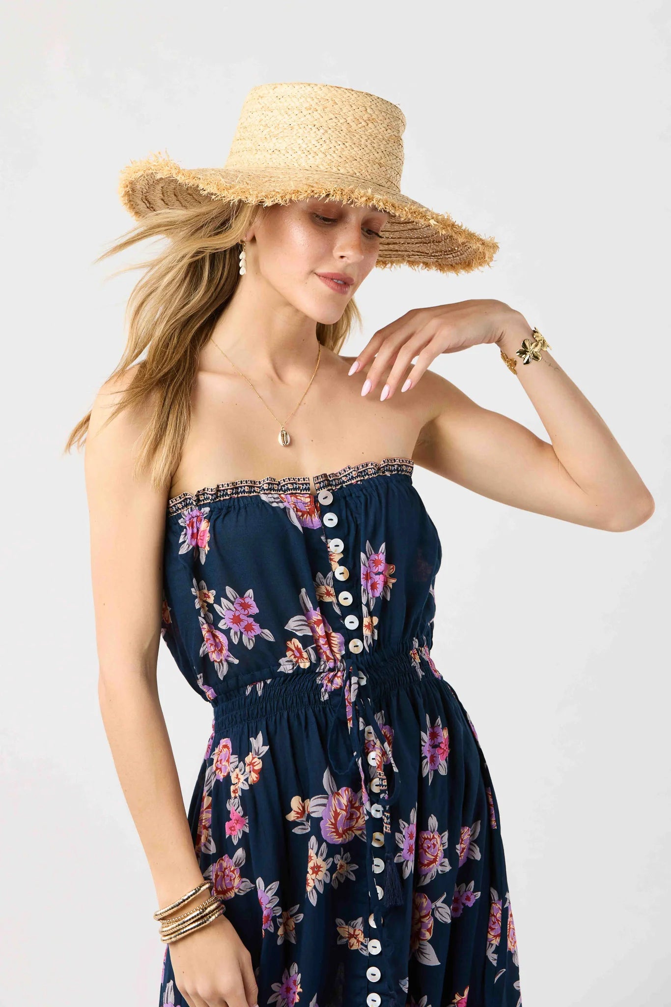 Strapless maxi dress with buttons down the front in navy with floral print