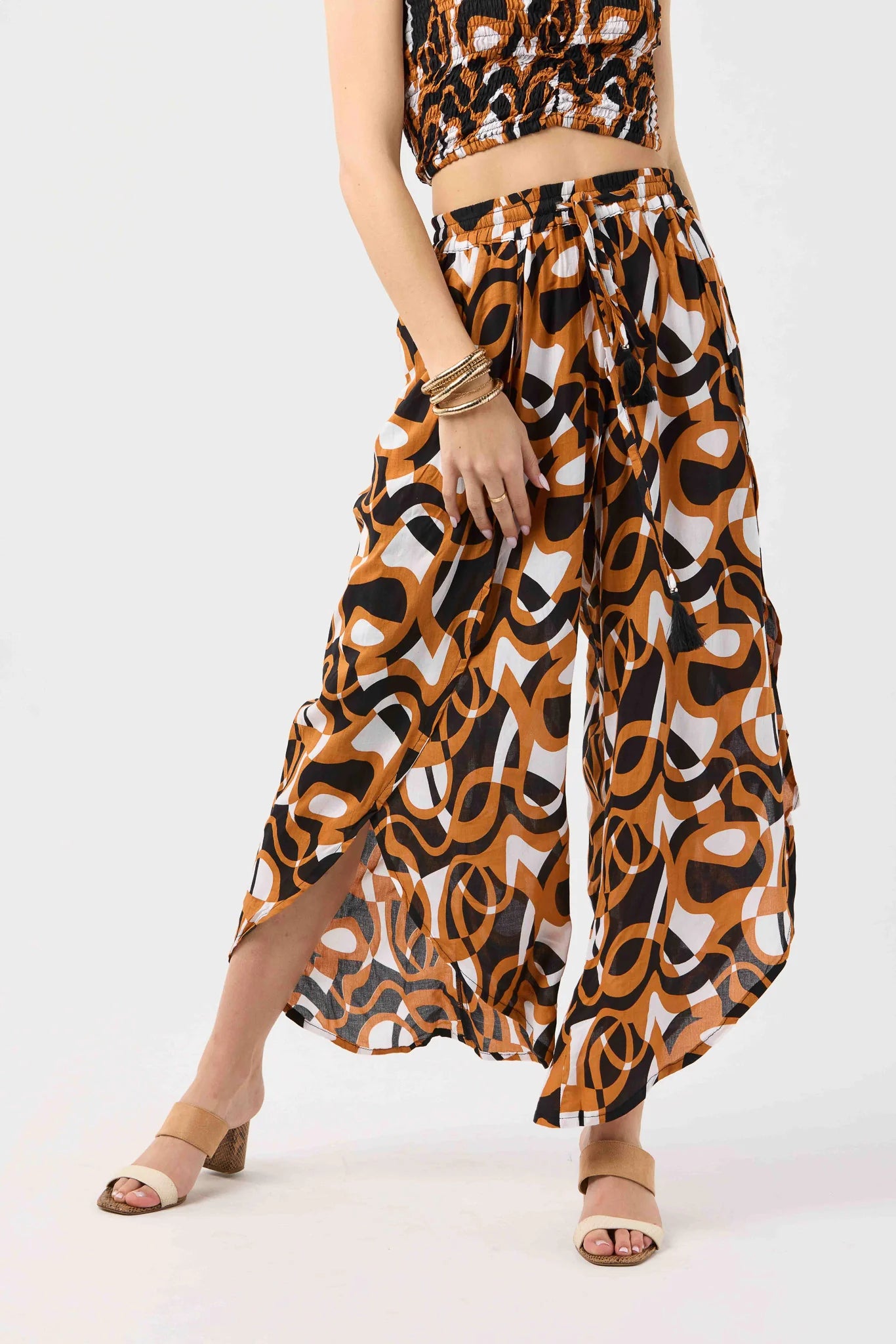 One size wide leg pants with elastic waist in black and brown print