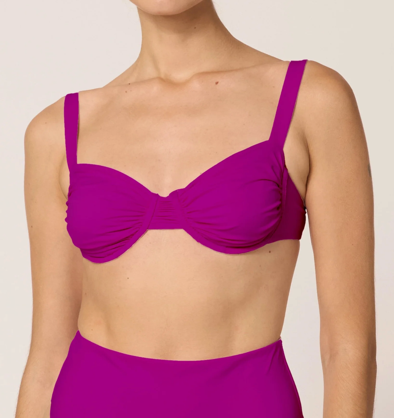Purple top with thick shoulder straps and underwire support