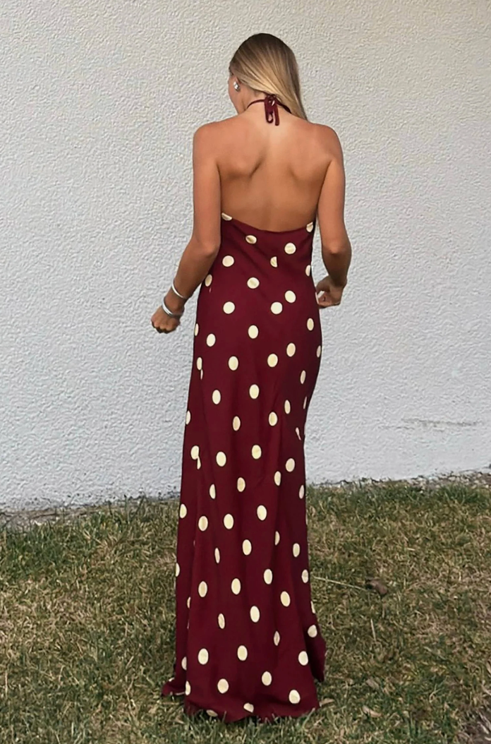 Maxi dress with halter neckline and open back in polka dot print