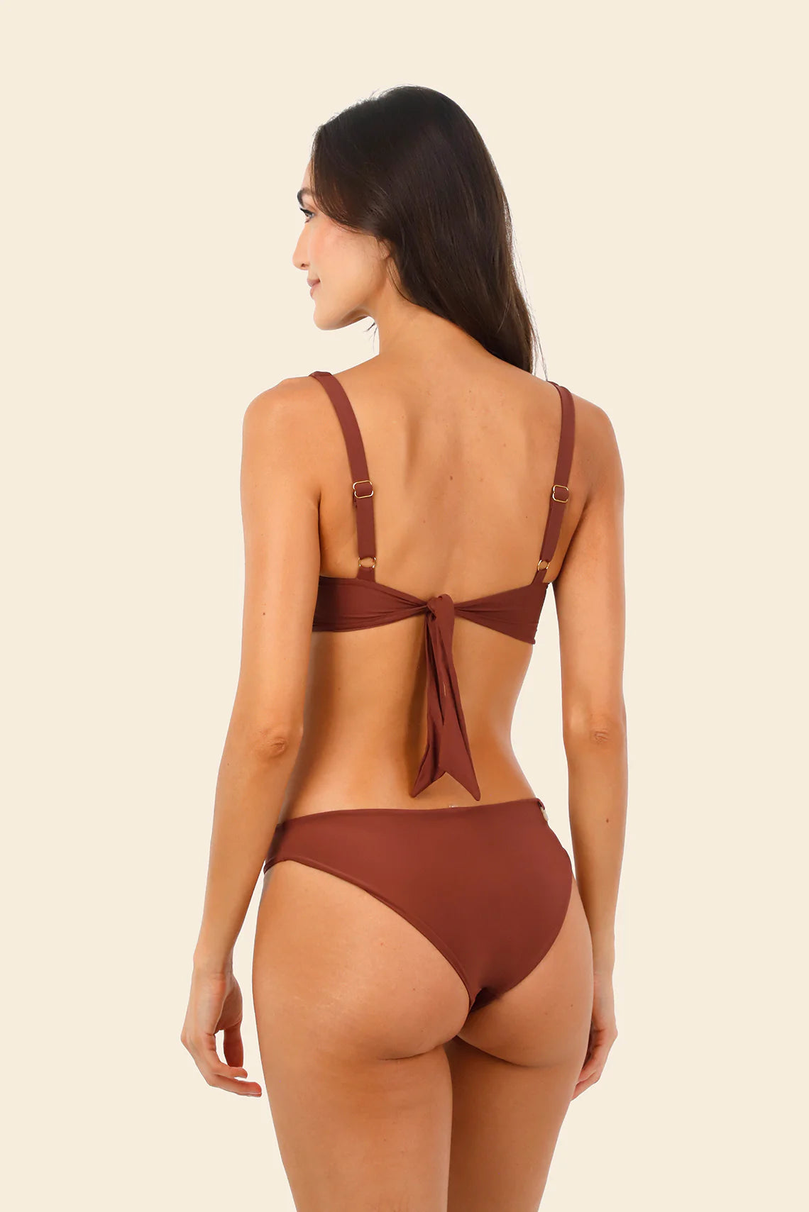 Knotted top that provides support and coverage in dark red