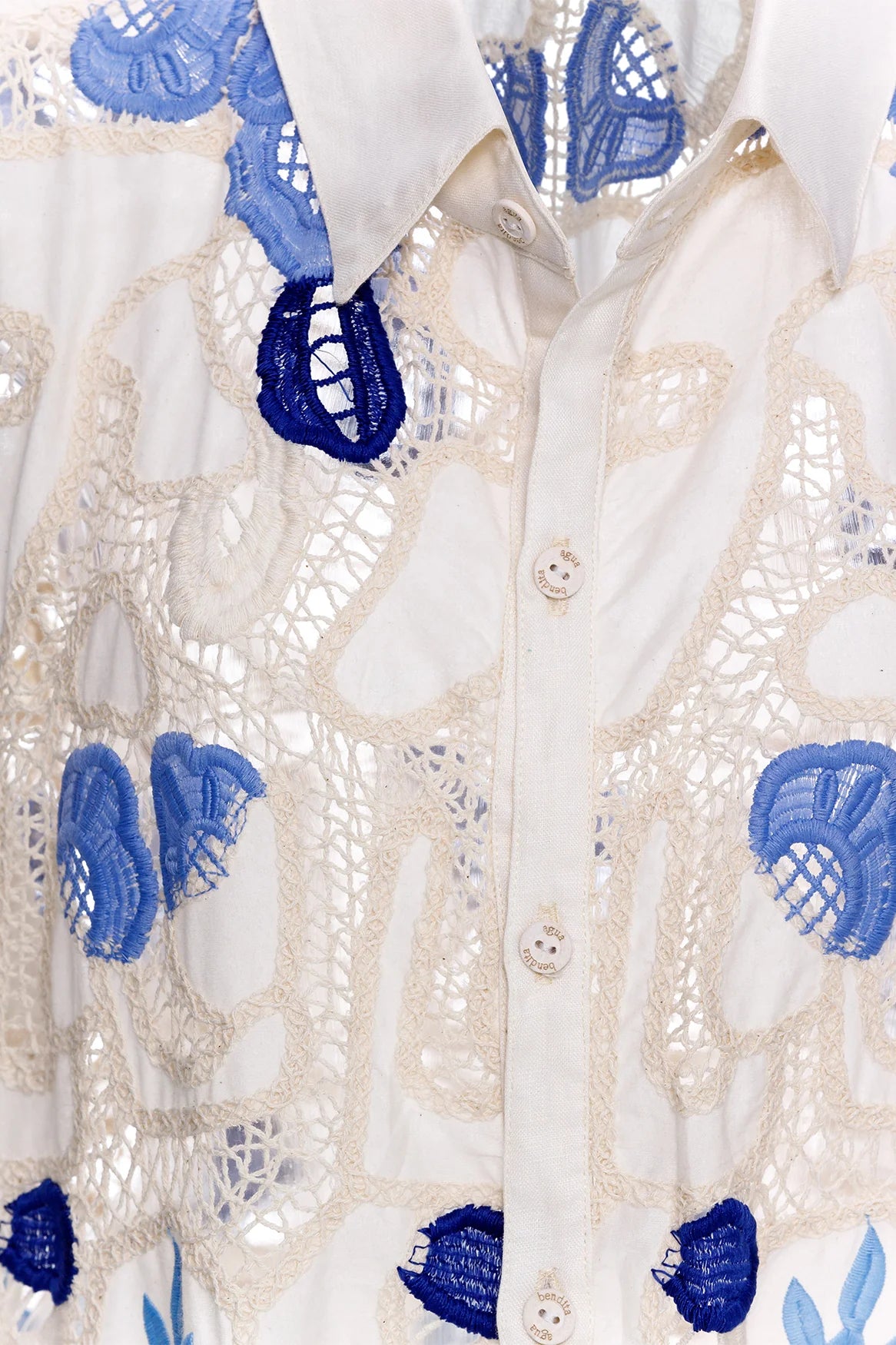 Collared button down shirt with crochet details and blue print