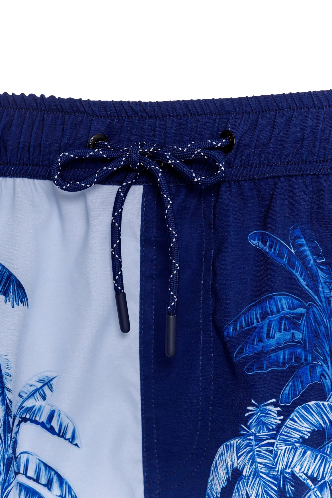 Men's drawstring swim trunks in blue tropical print