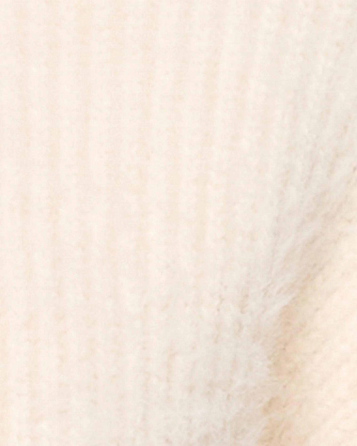 Soft zipper front sweater in cream