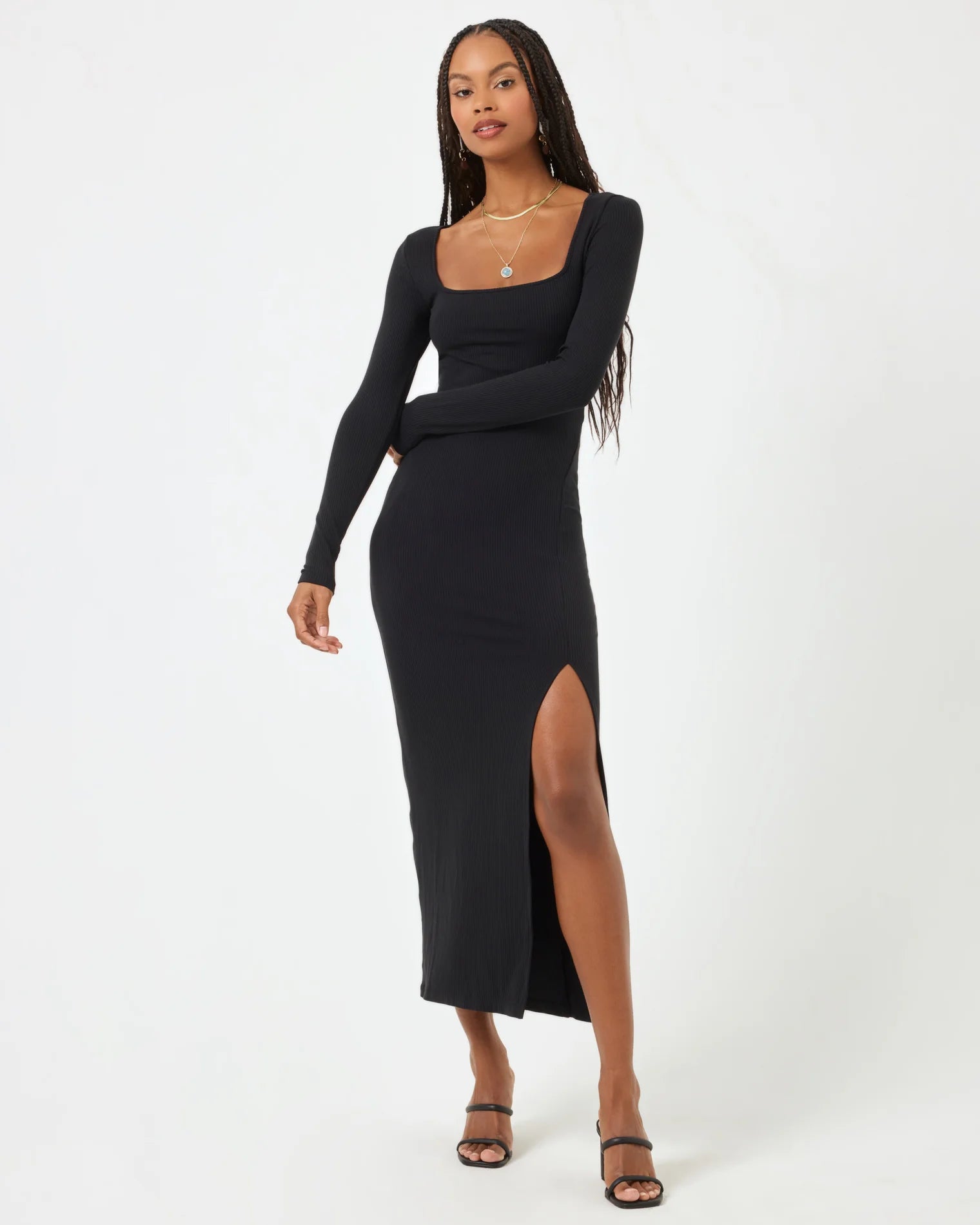 Ribbed long sleeve dress with a square neckline and side slit in black