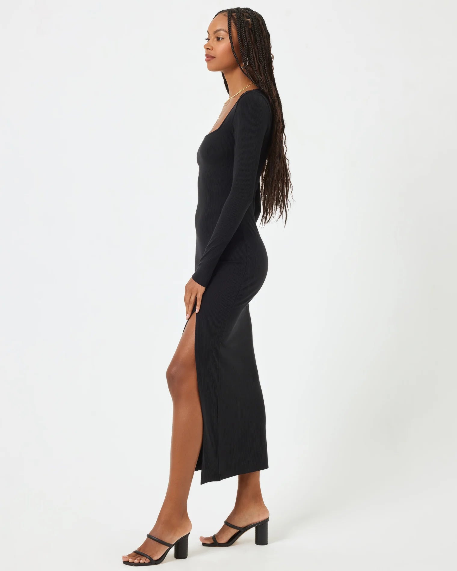 Ribbed long sleeve dress with a square neckline and side slit in black