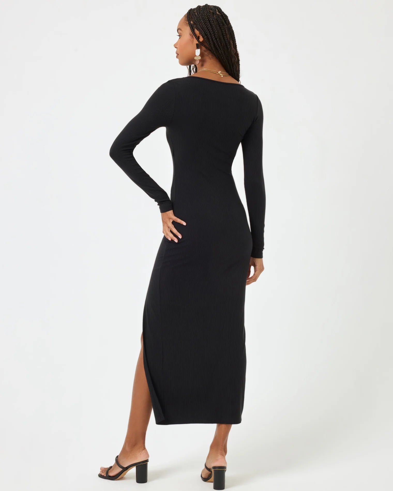 Ribbed long sleeve dress with a square neckline and side slit in black