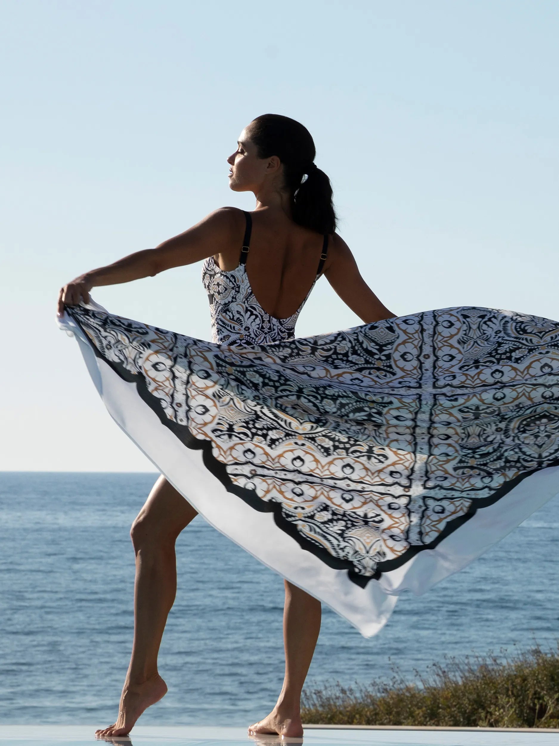 Long white sarong with black and gold print