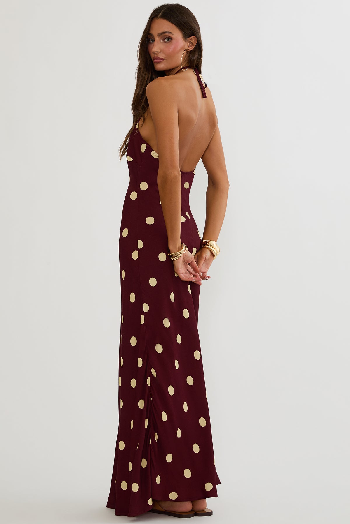 Maxi dress with halter neckline and open back in polka dot print