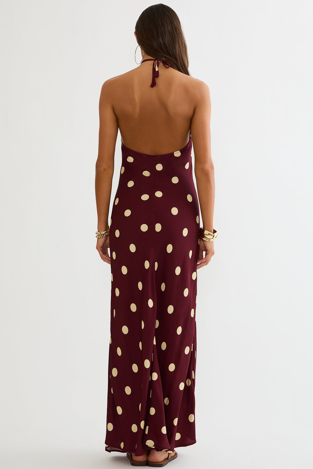Maxi dress with halter neckline and open back in polka dot print
