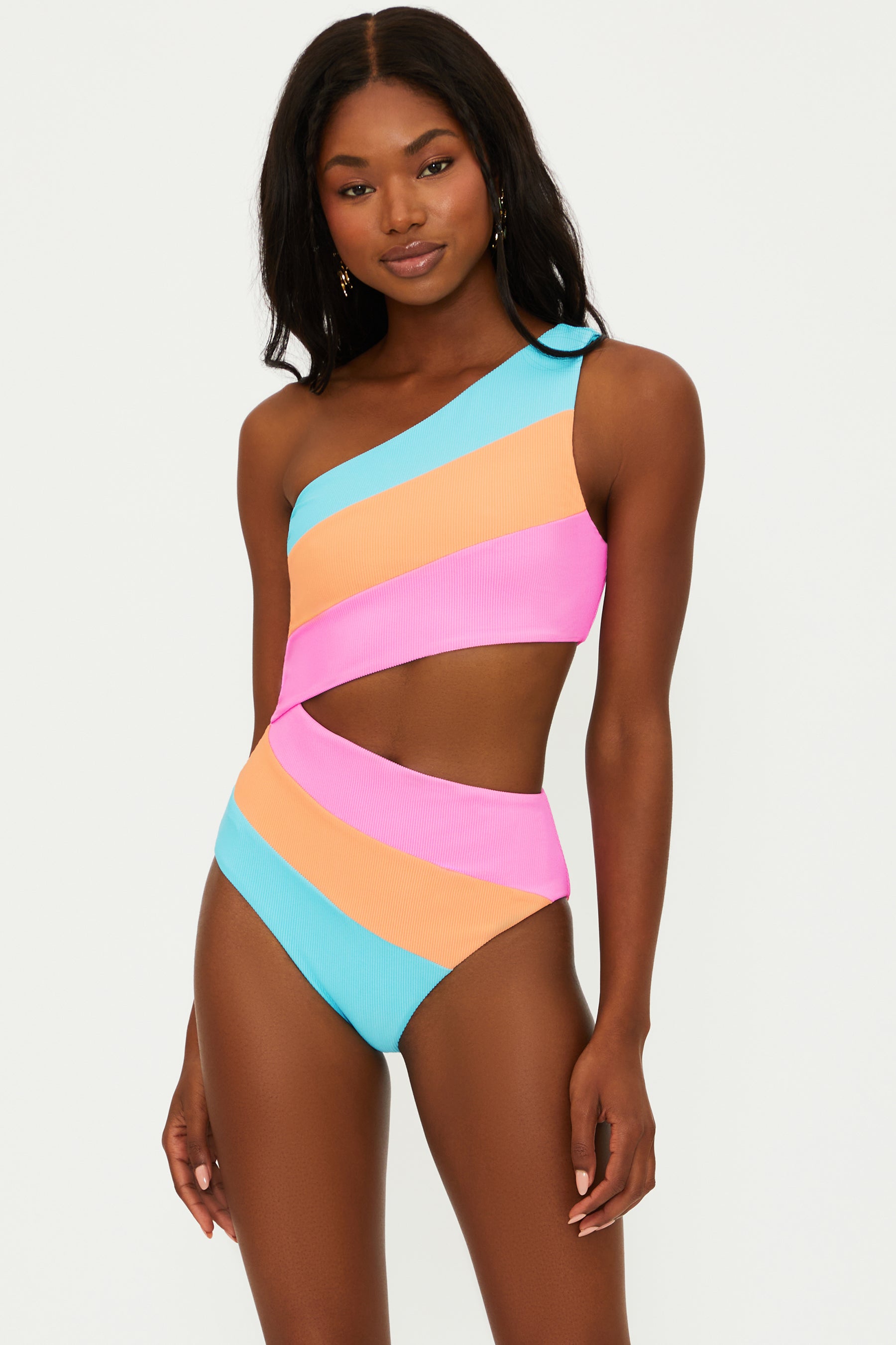 Bright multicolor one piece with an asymmetrical design featuring one shoulder strap and a side cutout