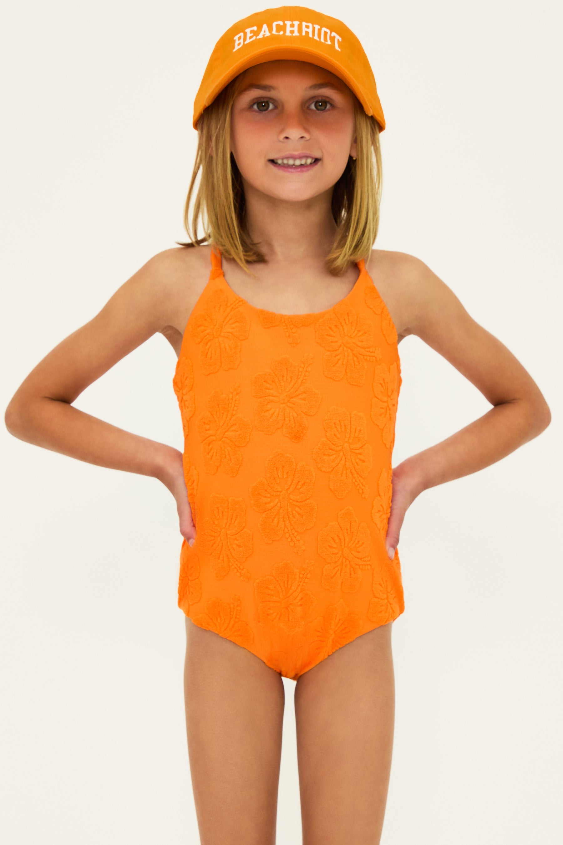 Kids terry cloth one piece in orange hibiscus print